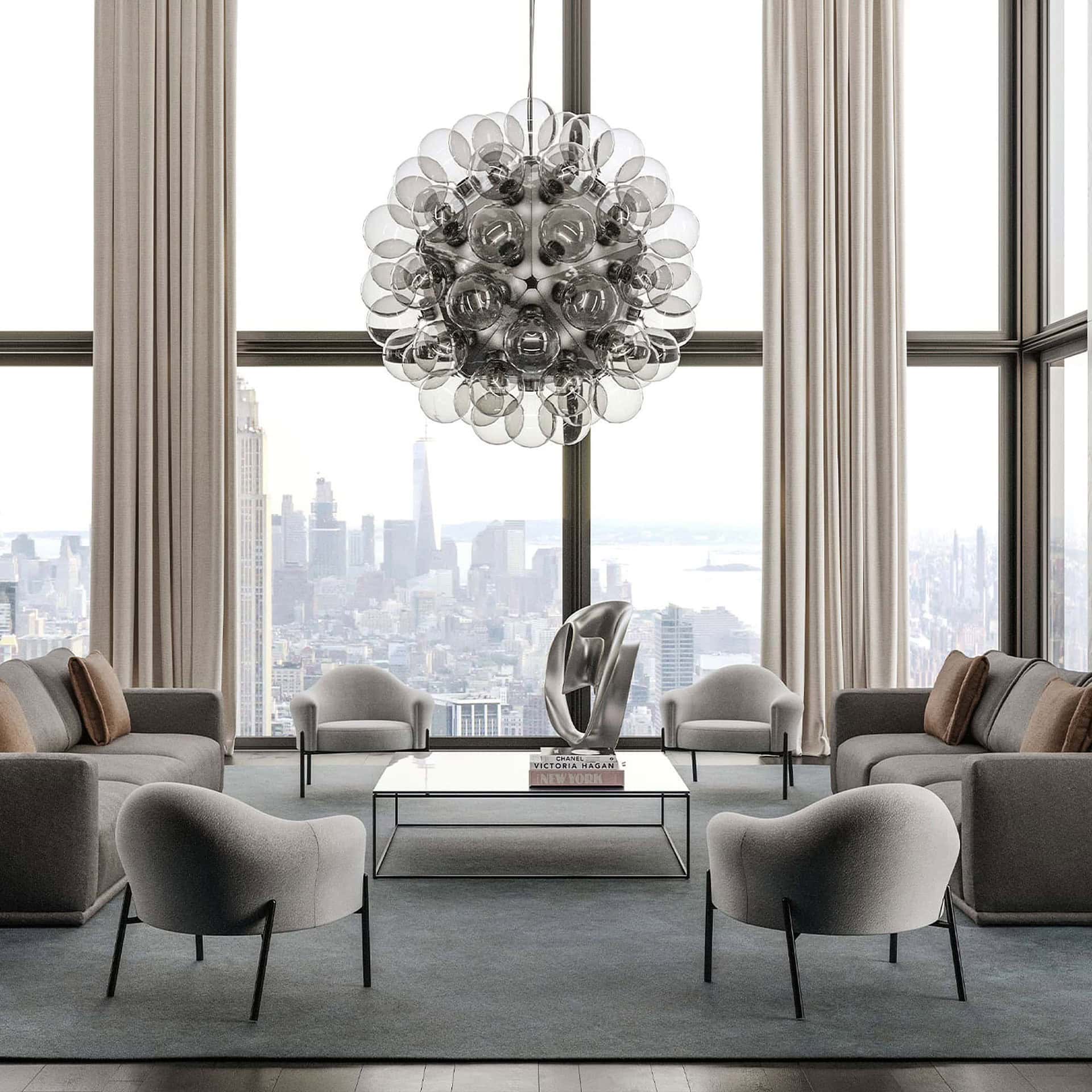 Quentin Upholstered Armchairs in a sophisticated interior with city view and elegant chandelier.