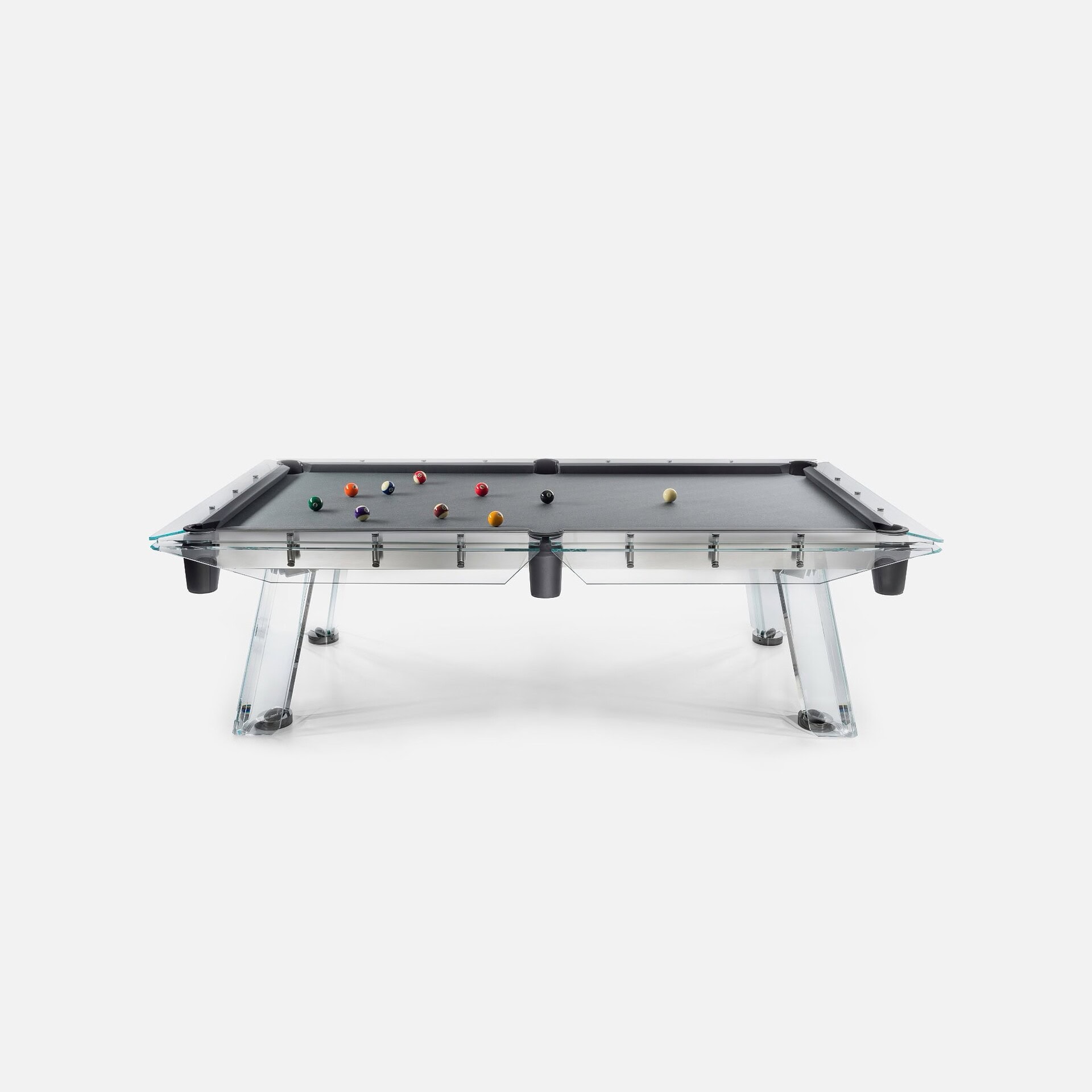 Sleek modern glass-top pool table with acrylic legs for stylish game room decor.