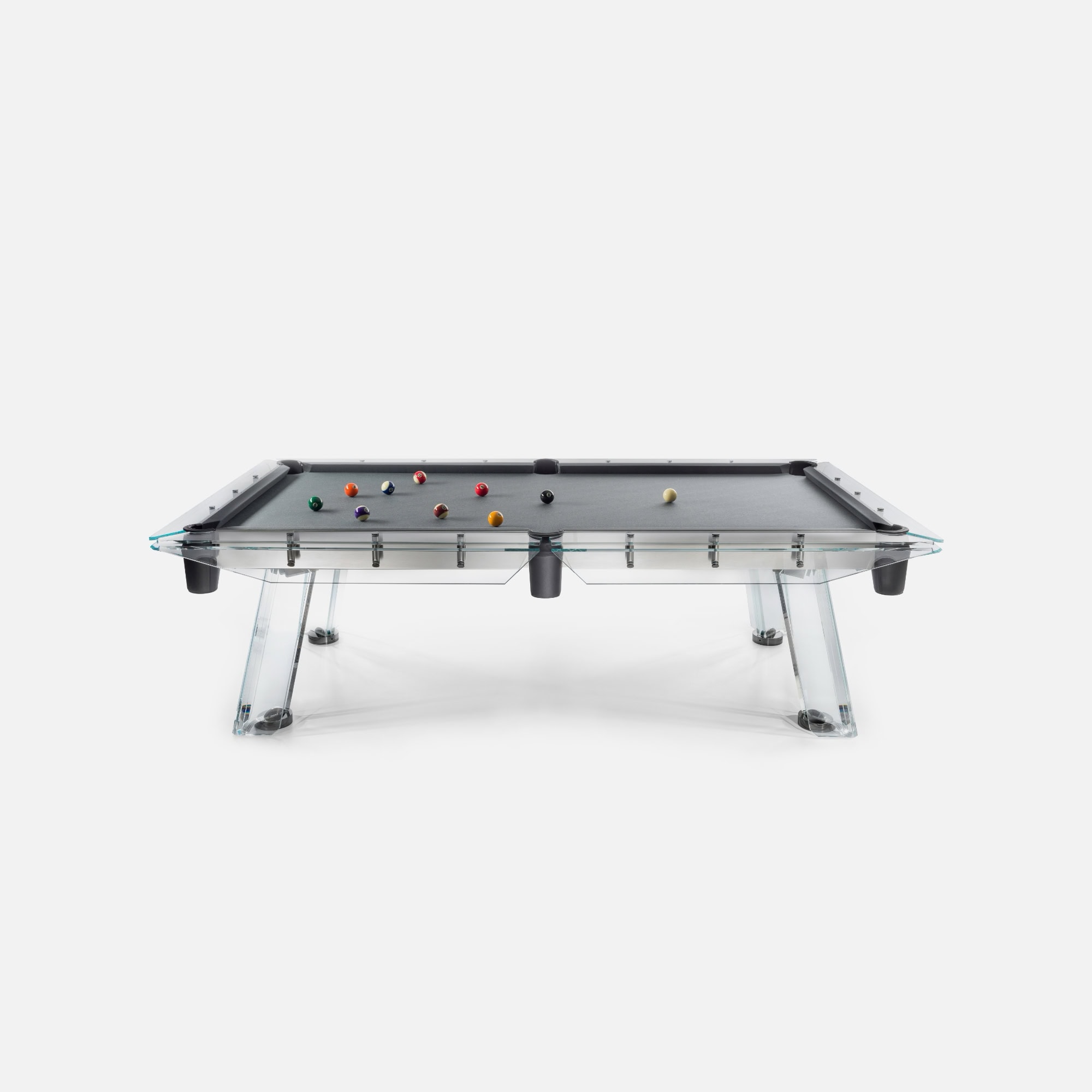 Sleek modern glass-top pool table with acrylic legs for stylish game room decor.