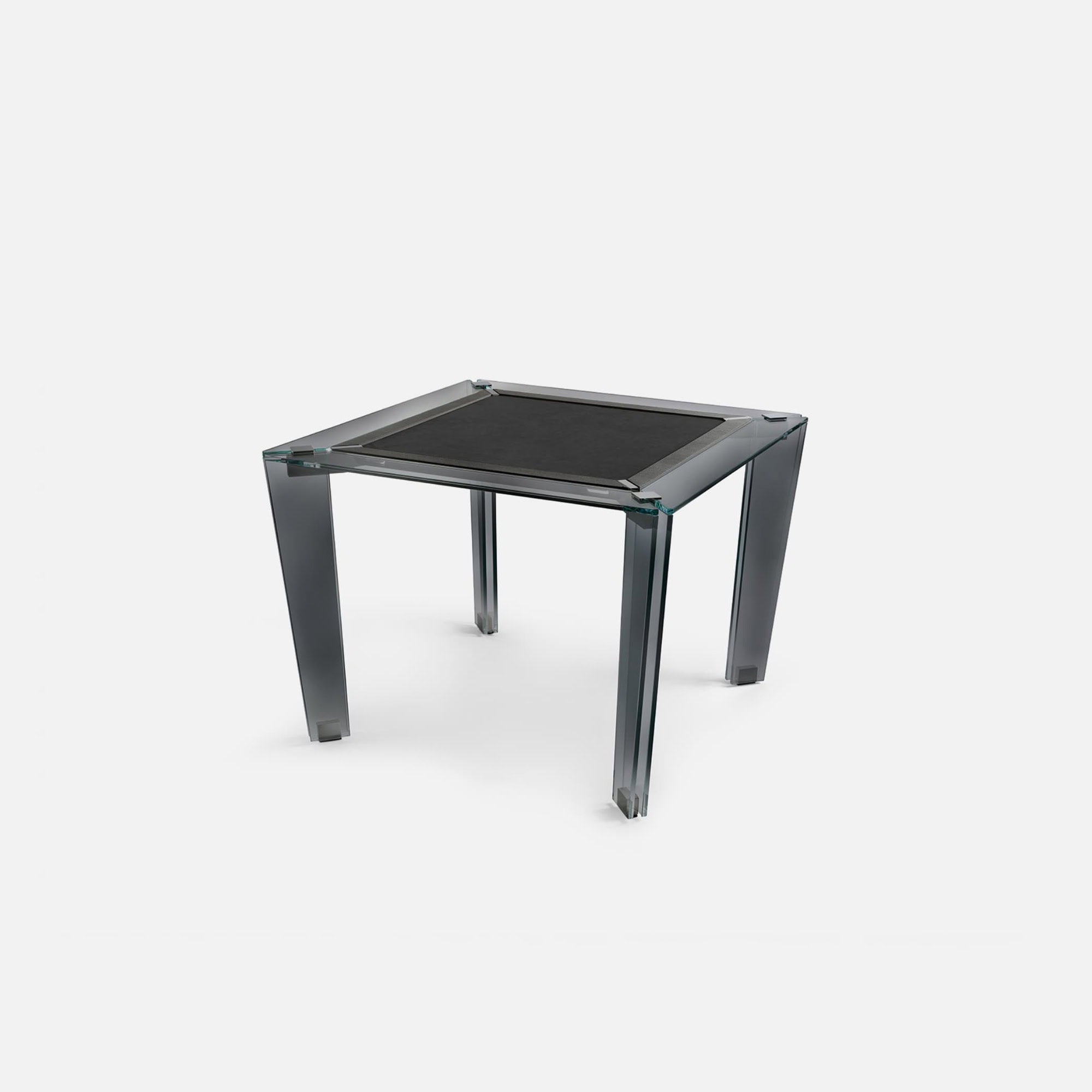 Sleek glass and metal side table, modern minimalist design for contemporary living spaces.