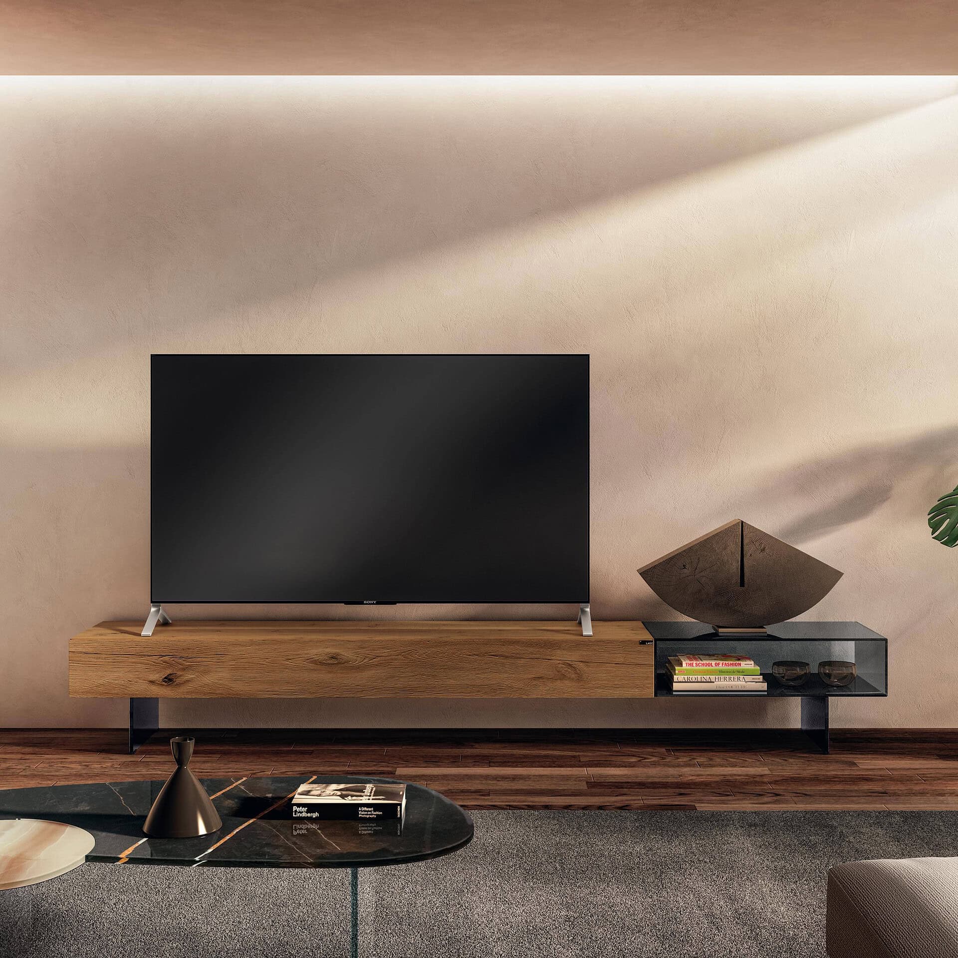 Contemporary wooden TV stand with decorative bowl and books in a stylish living room.