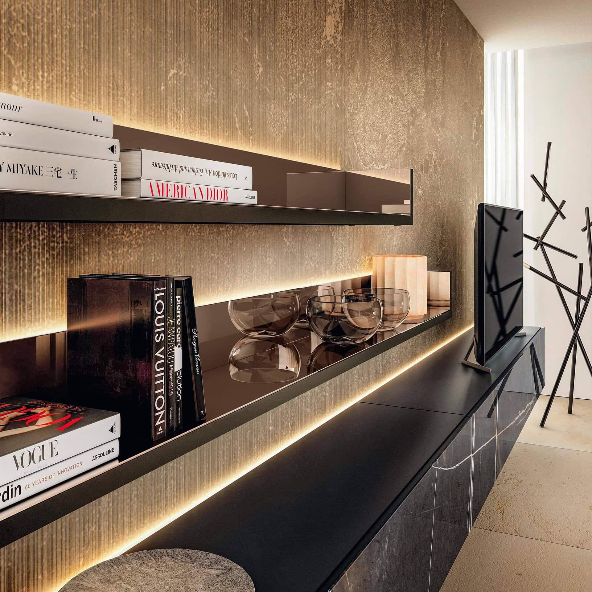 Sleek modern media console with black finish, integrated lighting, and decorative shelves showcasing contemporary home decor.