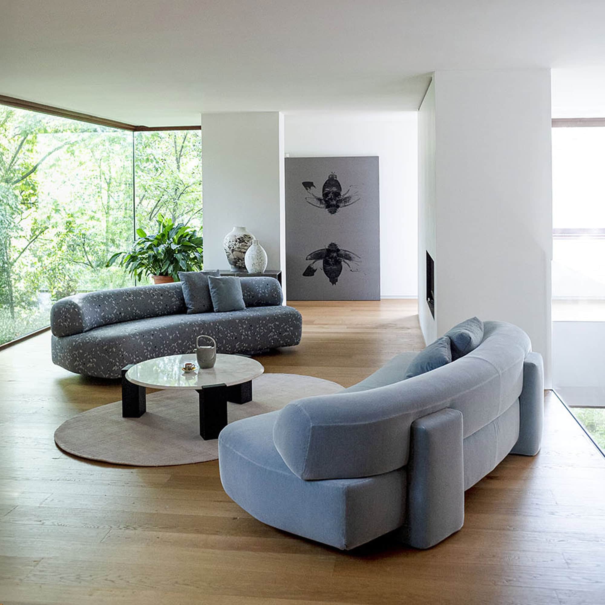 a living room with a couch and a table
