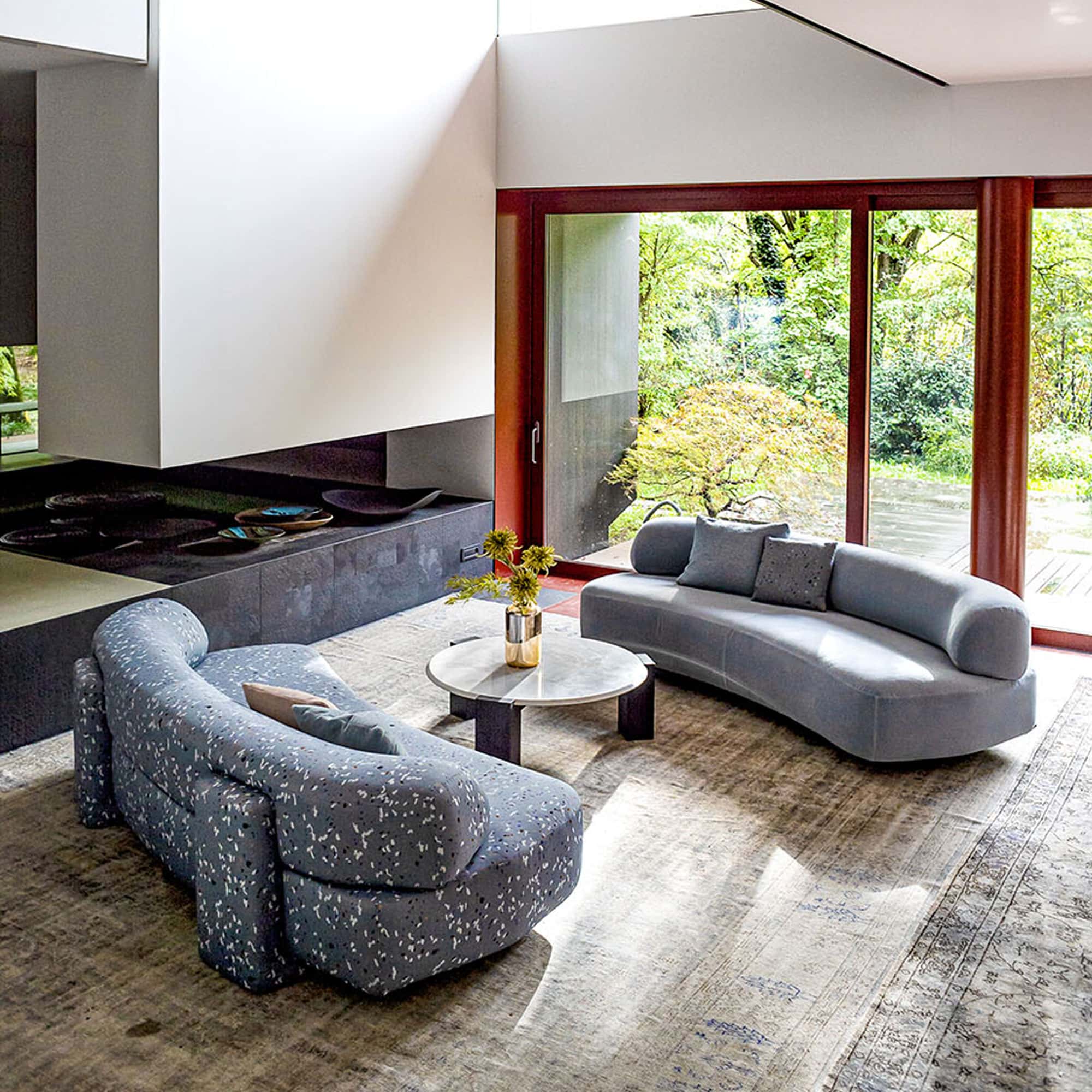 a living room with a couch and a fireplace