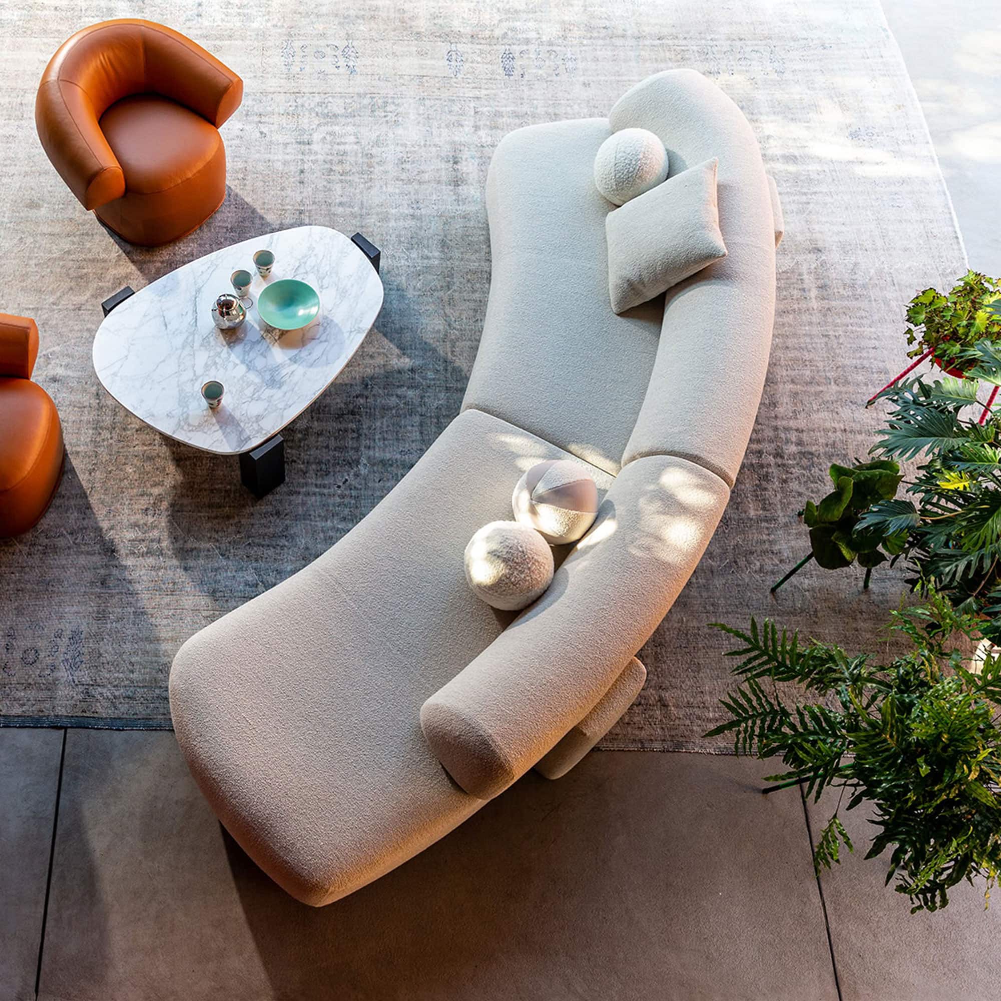 a couch and chairs in a room