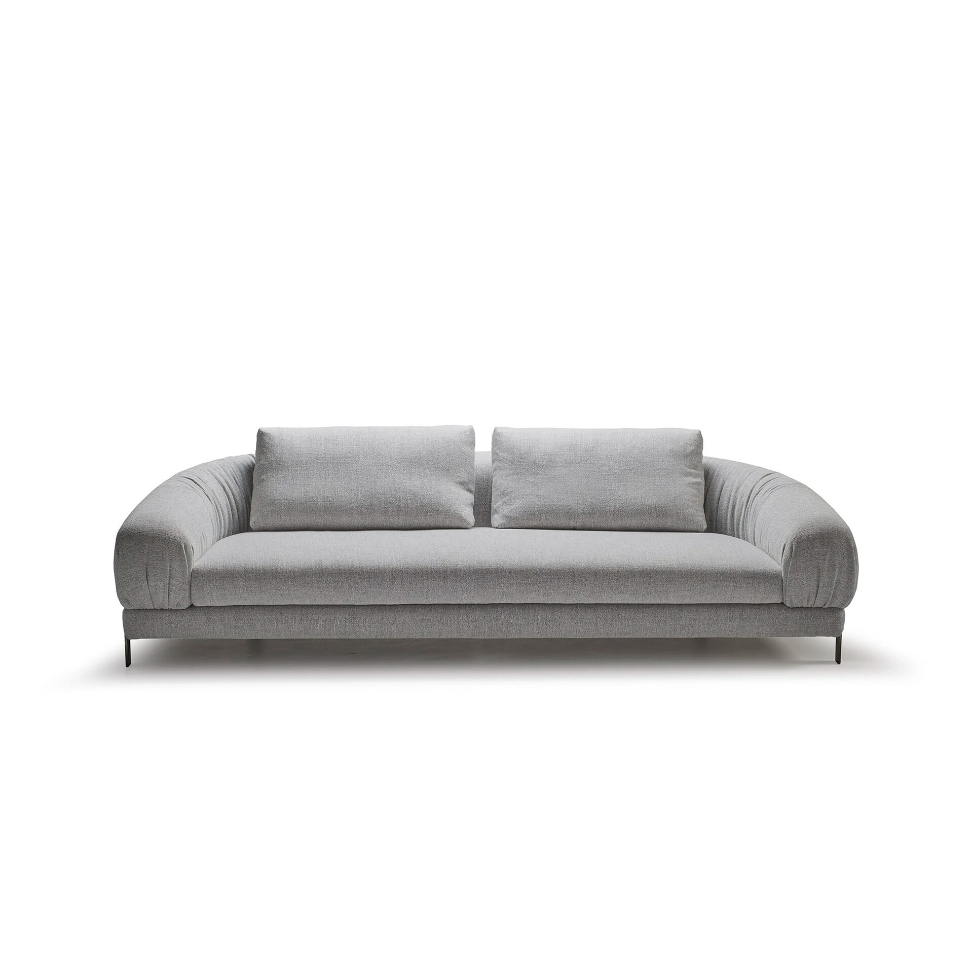 A modern light grey sofa with rounded, gathered armrests and two back cushions, set against a white background.