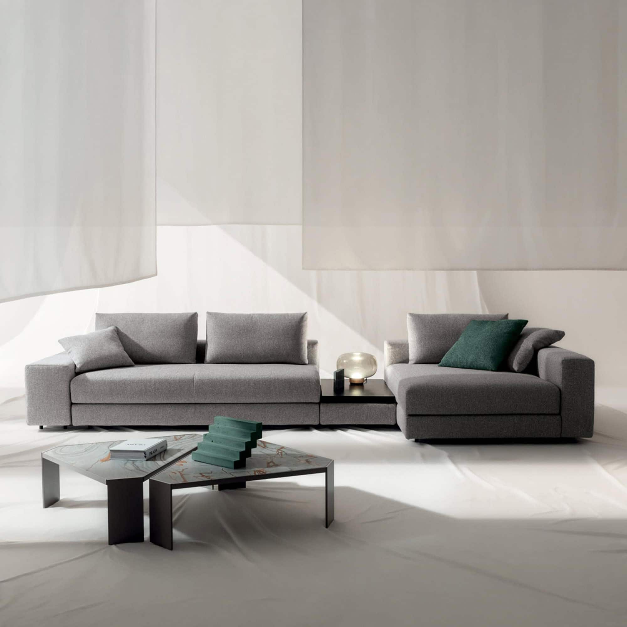 Modern Kuba Plain Modular Sectional Sofa in gray fabric. Perfect for contemporary living rooms.