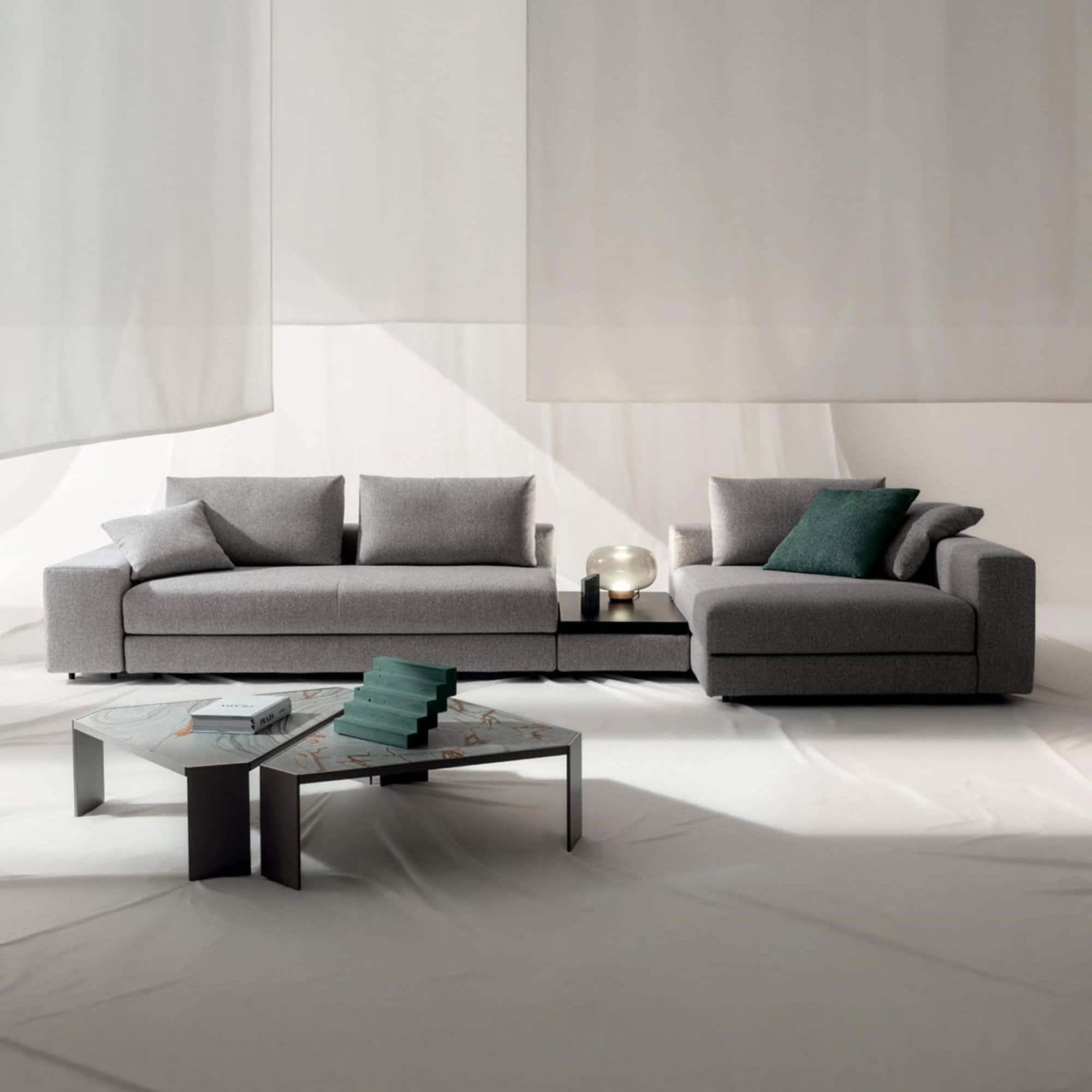 Modern Kuba Plain Modular Sectional Sofa in gray fabric. Perfect for contemporary living rooms.