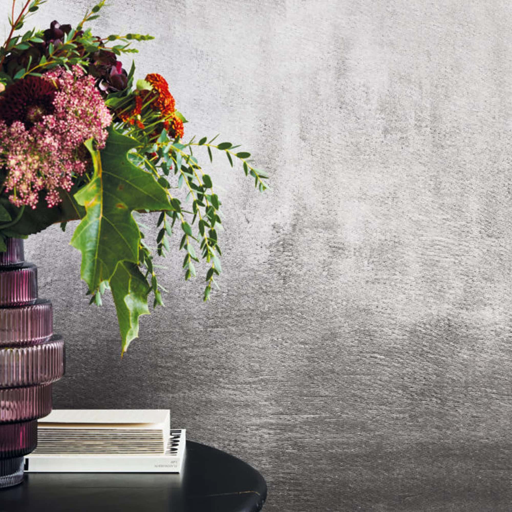 a vase with flowers on a table