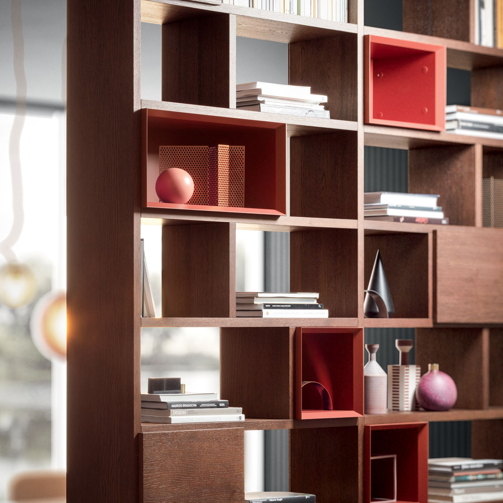 Close-up of Pianca Spazioteca modular shelving system with mixed open and closed compartments