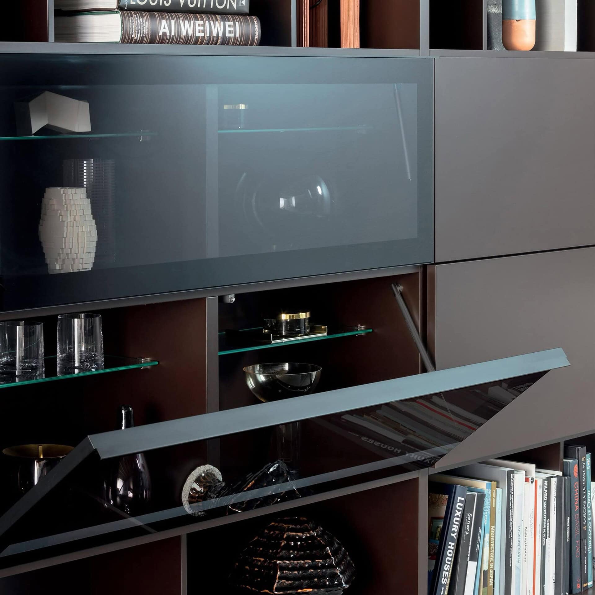 Close-up of Pianca Spazioteca Modular Wall Unit with lift-up cabinet door and internal storage