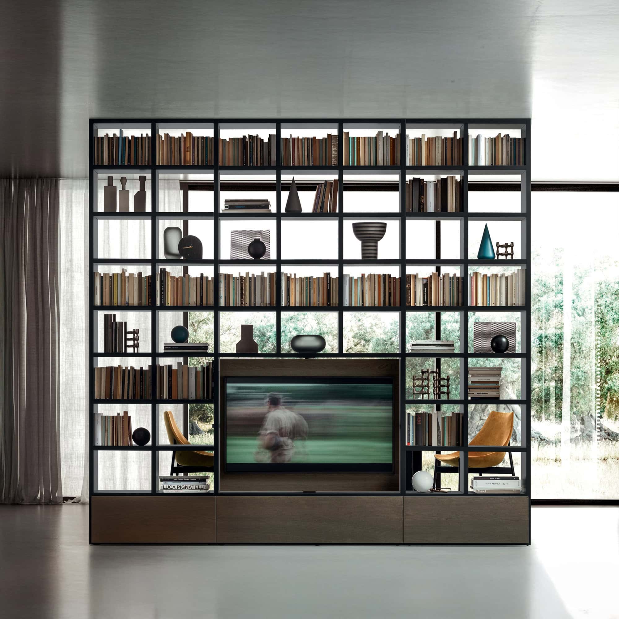Full-height Pianca Spazioteca Modular Wall Unit in minimalist living space with built-in shelving and media area