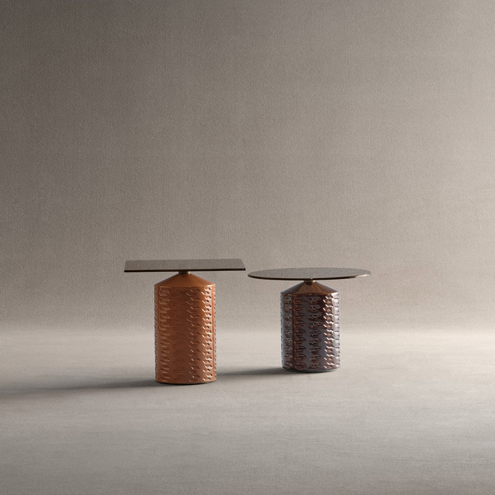 Hishi Glazed Ceramic Side Tables in peach and black finishes with bronze glass tops, shown in tall and low height variations.
