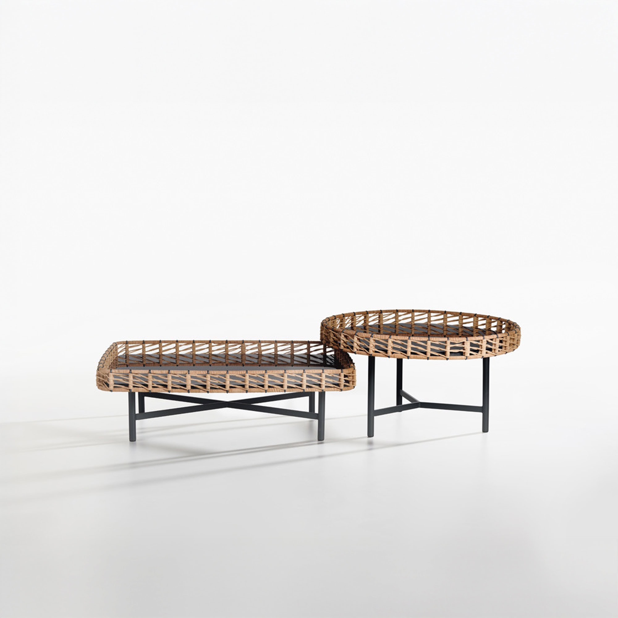 Ropu Woven Coffee Tables in round and rectangular designs, displayed on a white backdrop highlighting their hide rope border and metal base.