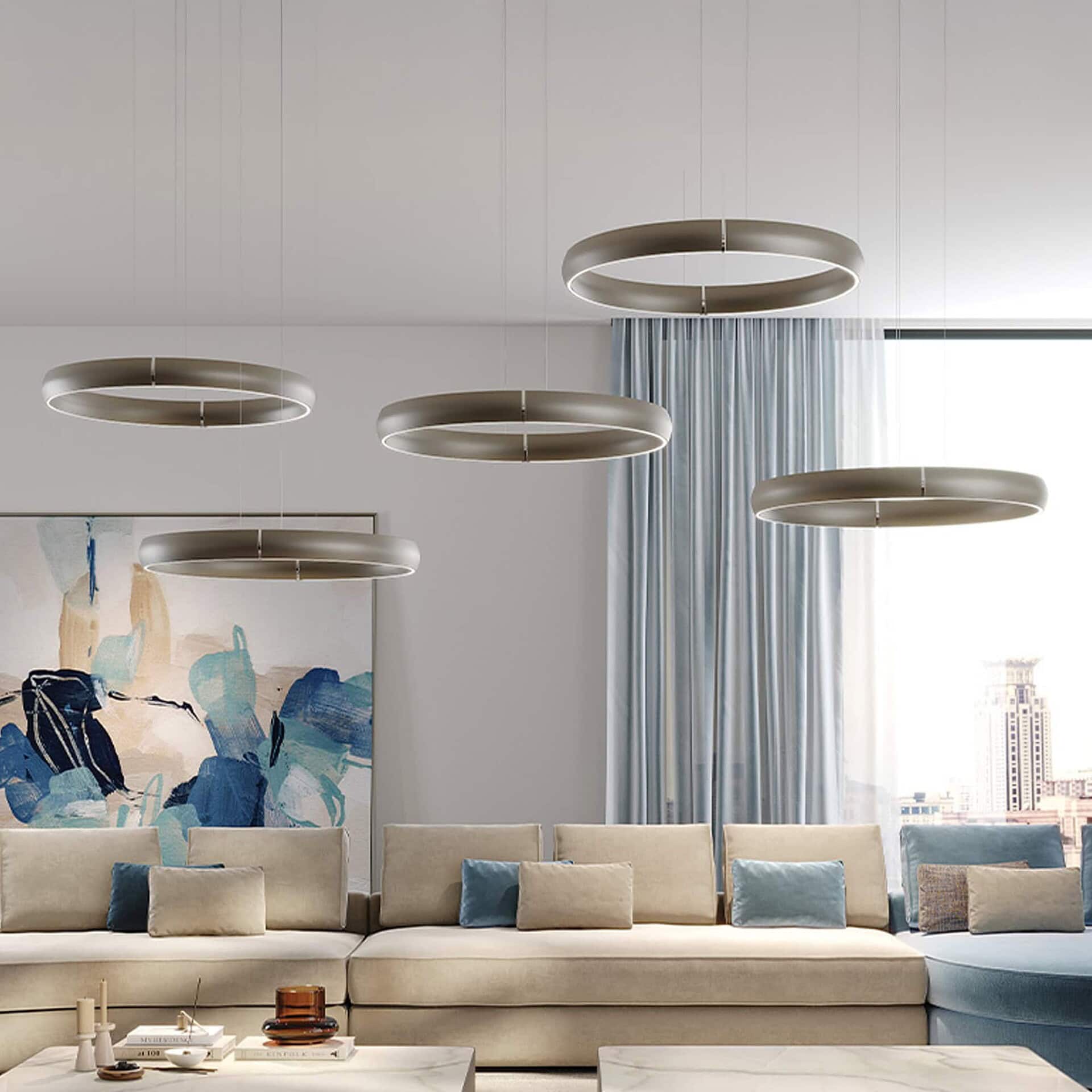 Multi-ring Cerchio Ring Suspension Light installed in a contemporary living room with large windows.
