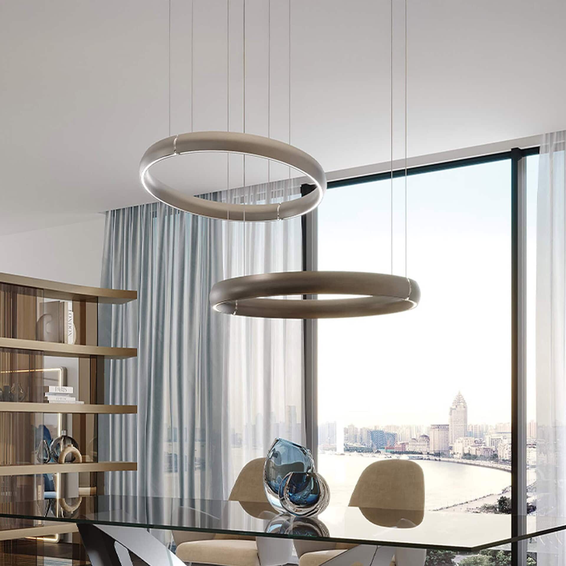 Cerchio Ring Suspension Light shown in a modern interior, featuring cascading rings at varying heights.