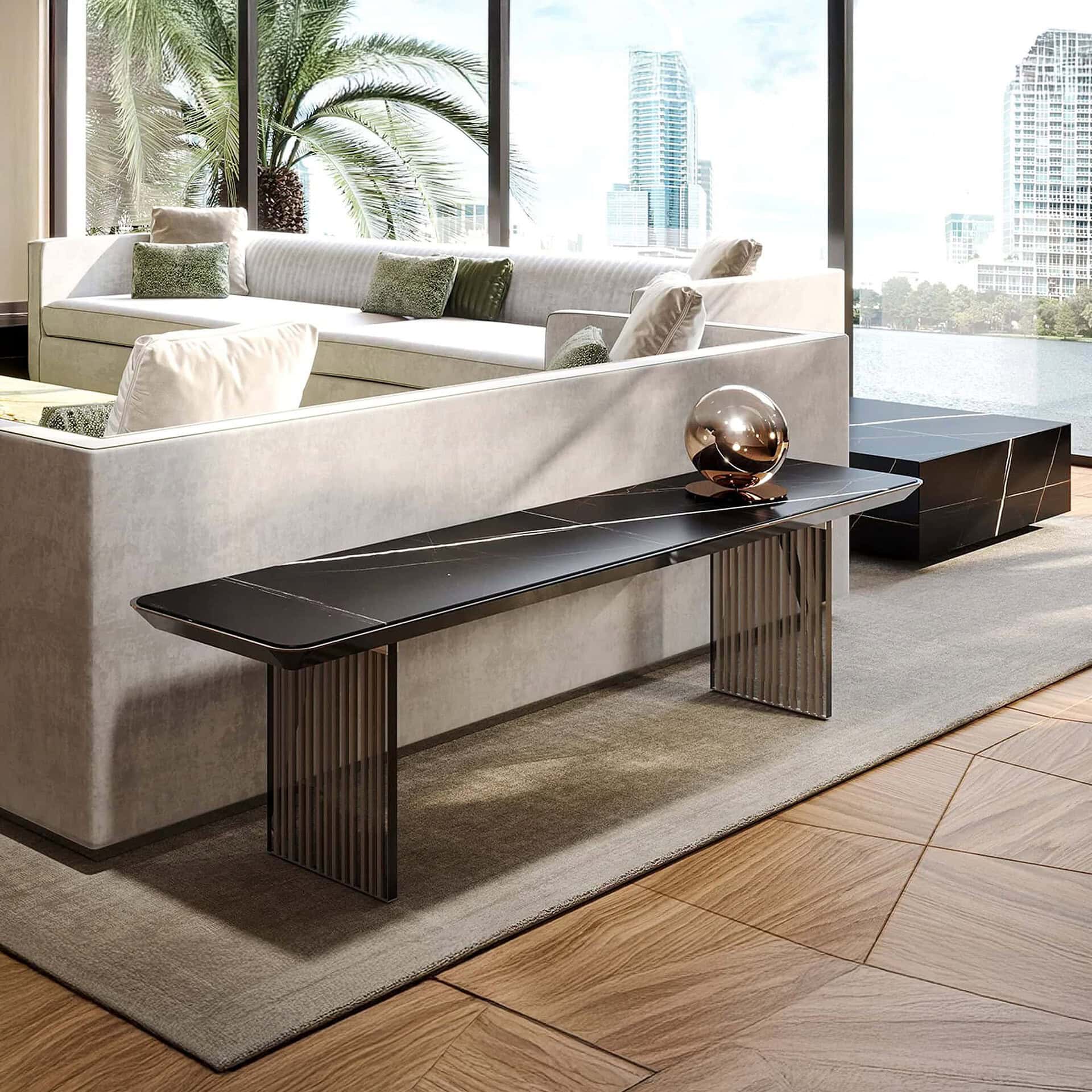 Contemporary living room with luxurious sofa and elegant black marble coffee tables by Sklar Furnishings.