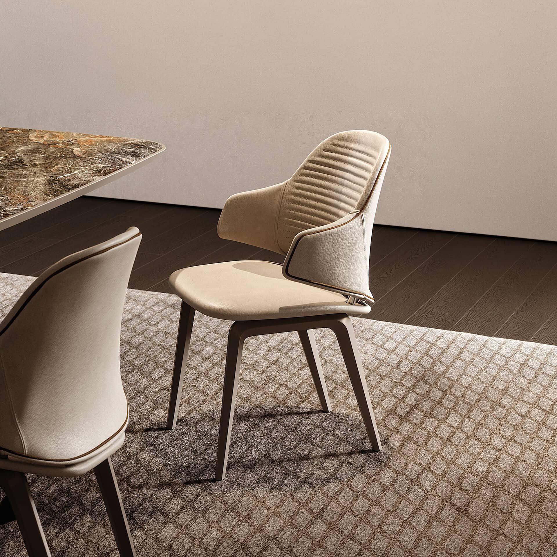 Vela Upholstered Dining Chair in a warm-toned interior dining setup with patterned rug and modern table.