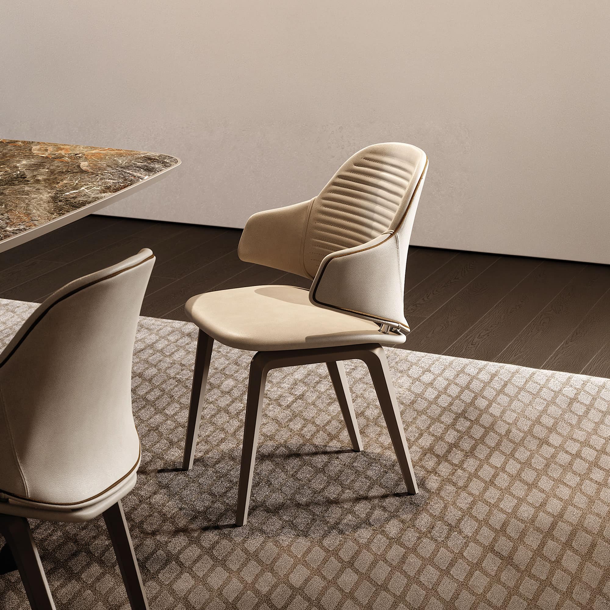 Vela Upholstered Dining Chair in a warm-toned interior dining setup with patterned rug and modern table.