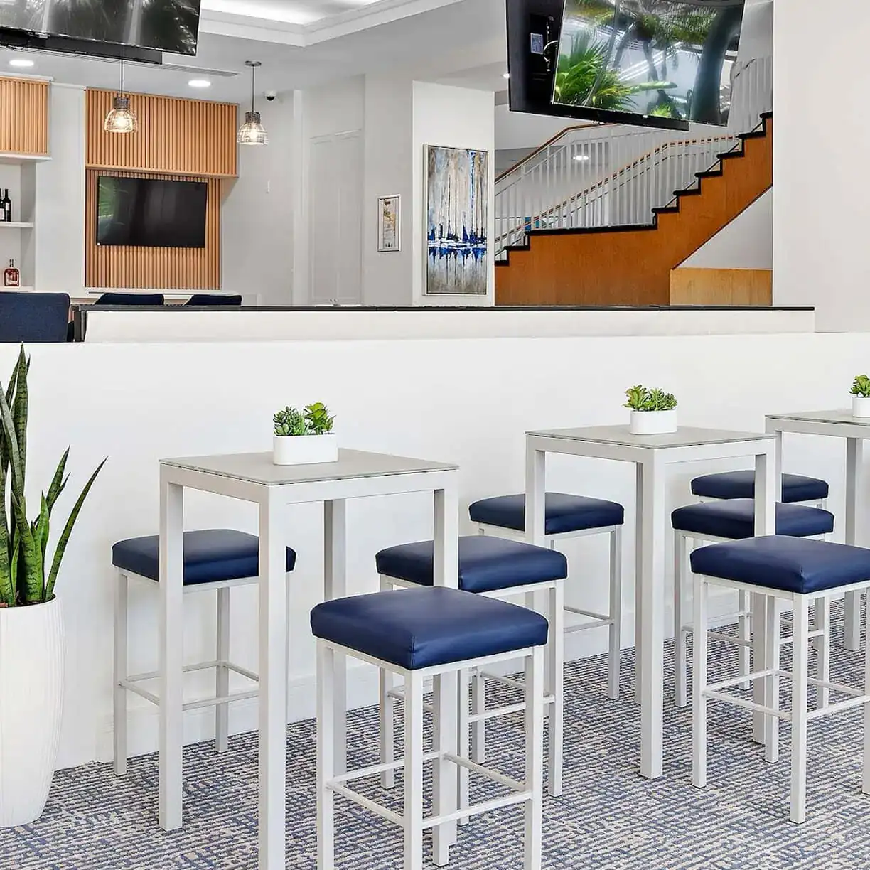 A Room With Tables And Chairs