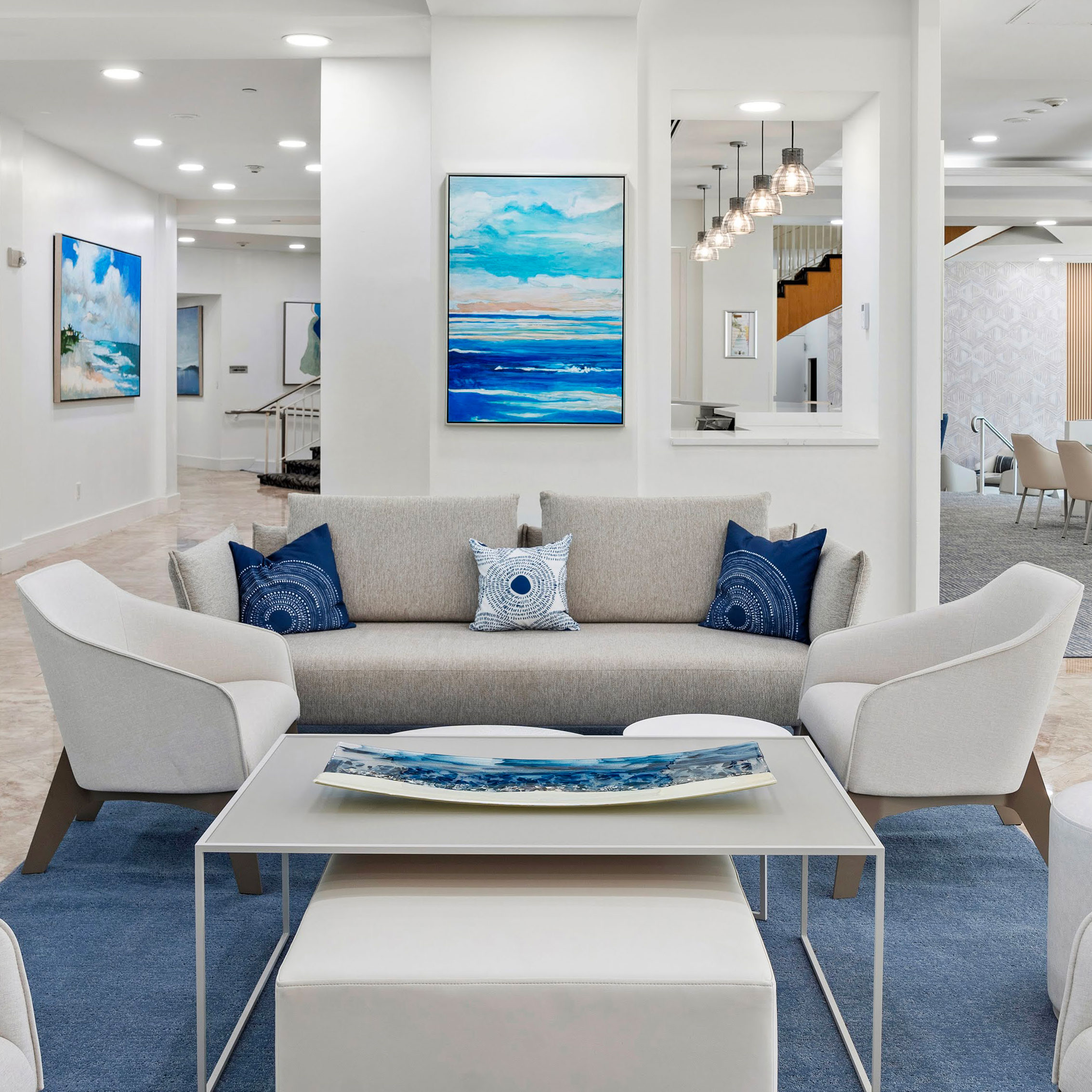 A Room With A Couch And Chairs