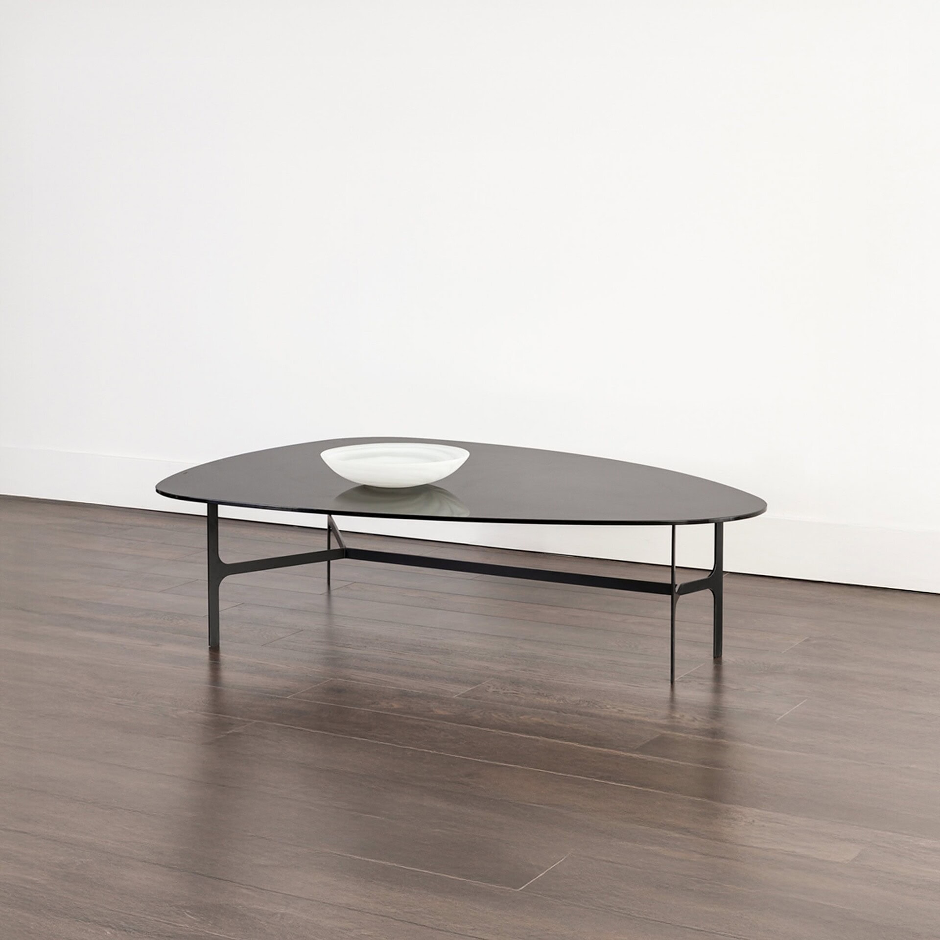 Sleek black modern coffee table with minimalist design, ideal for contemporary living rooms.