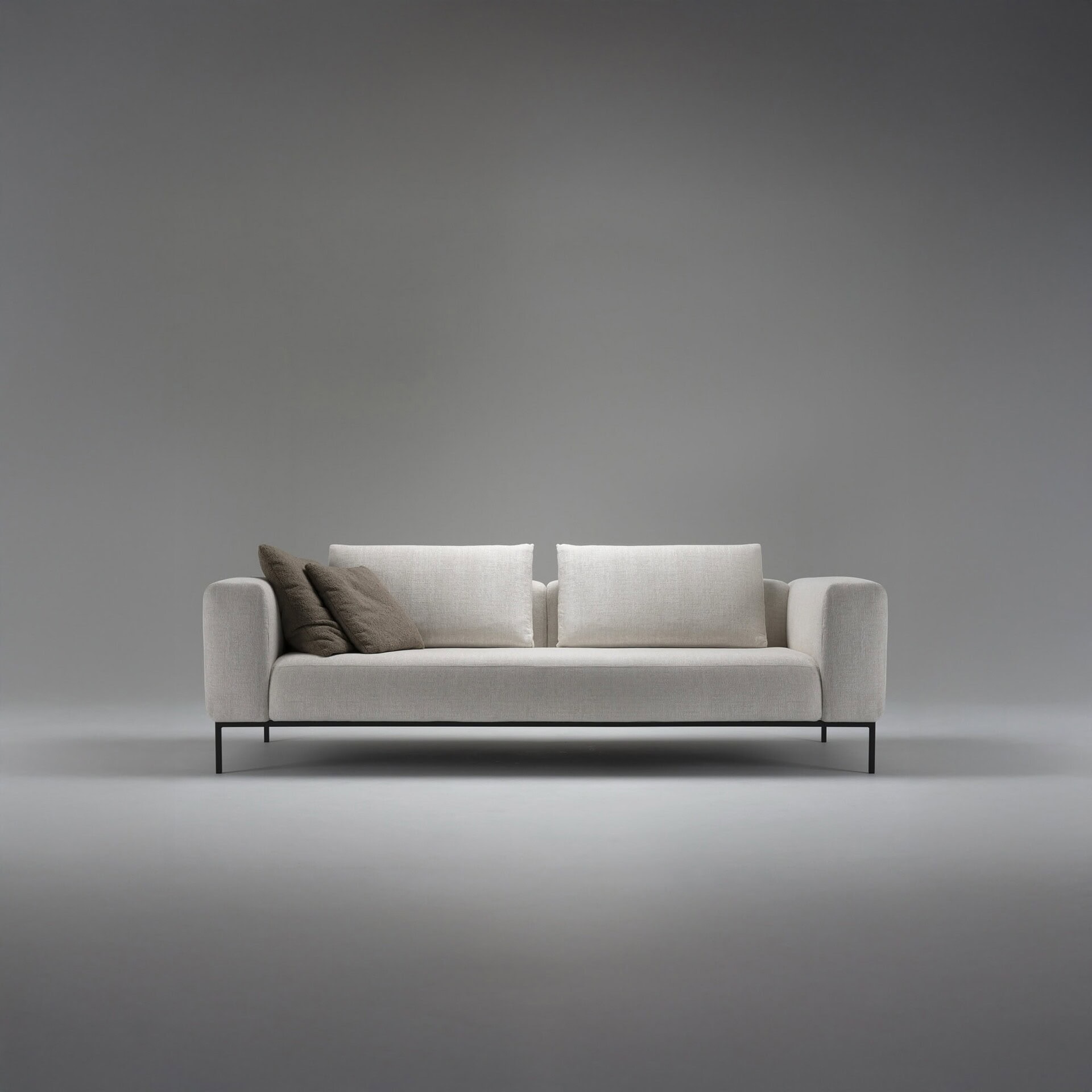 Sleek modern sofa with clean lines and neutral upholstery, perfect for contemporary living rooms.