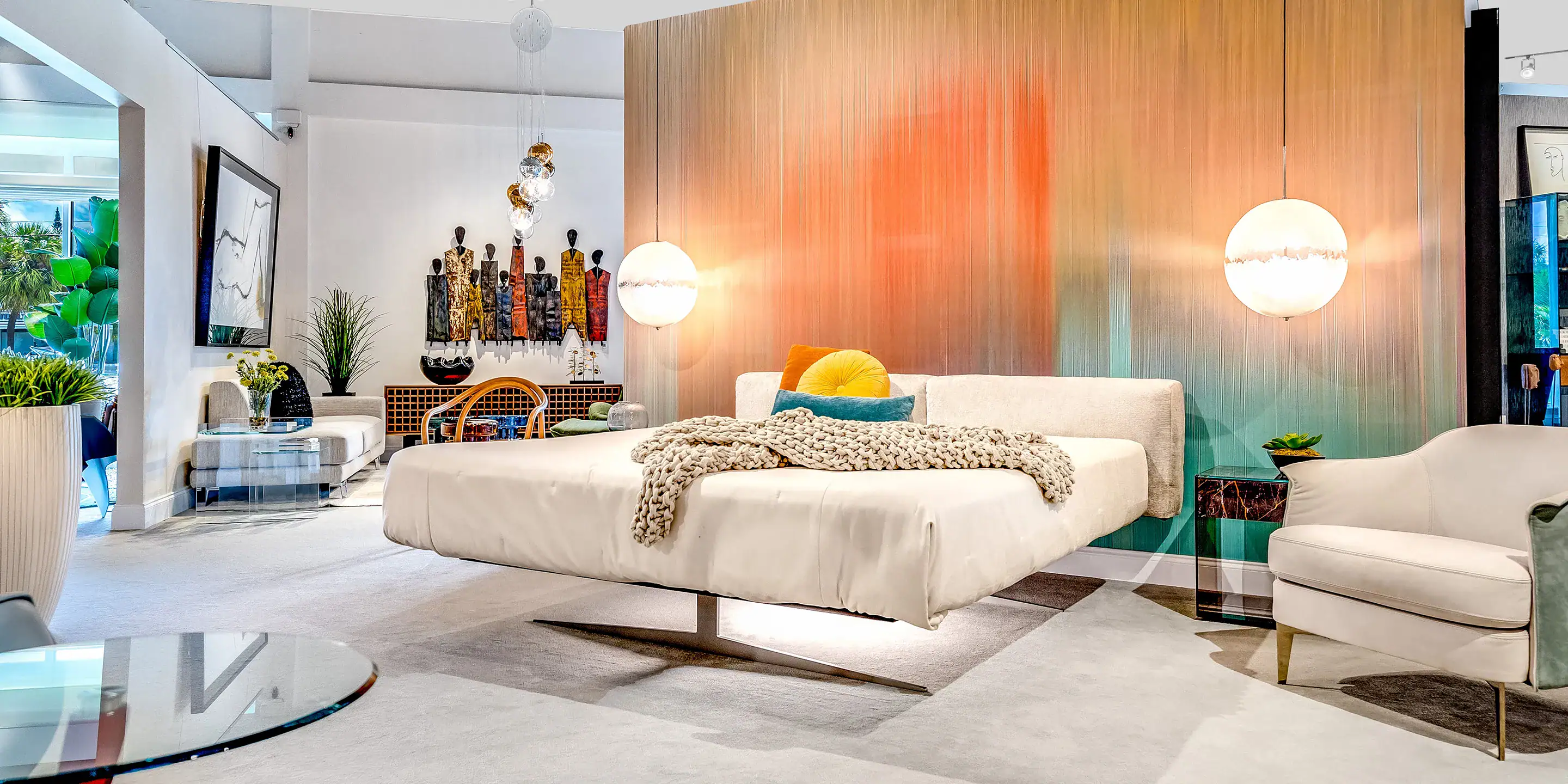 Luxurious modern bedroom with colorful decor and contemporary furnishings from Sklar Furnishings.