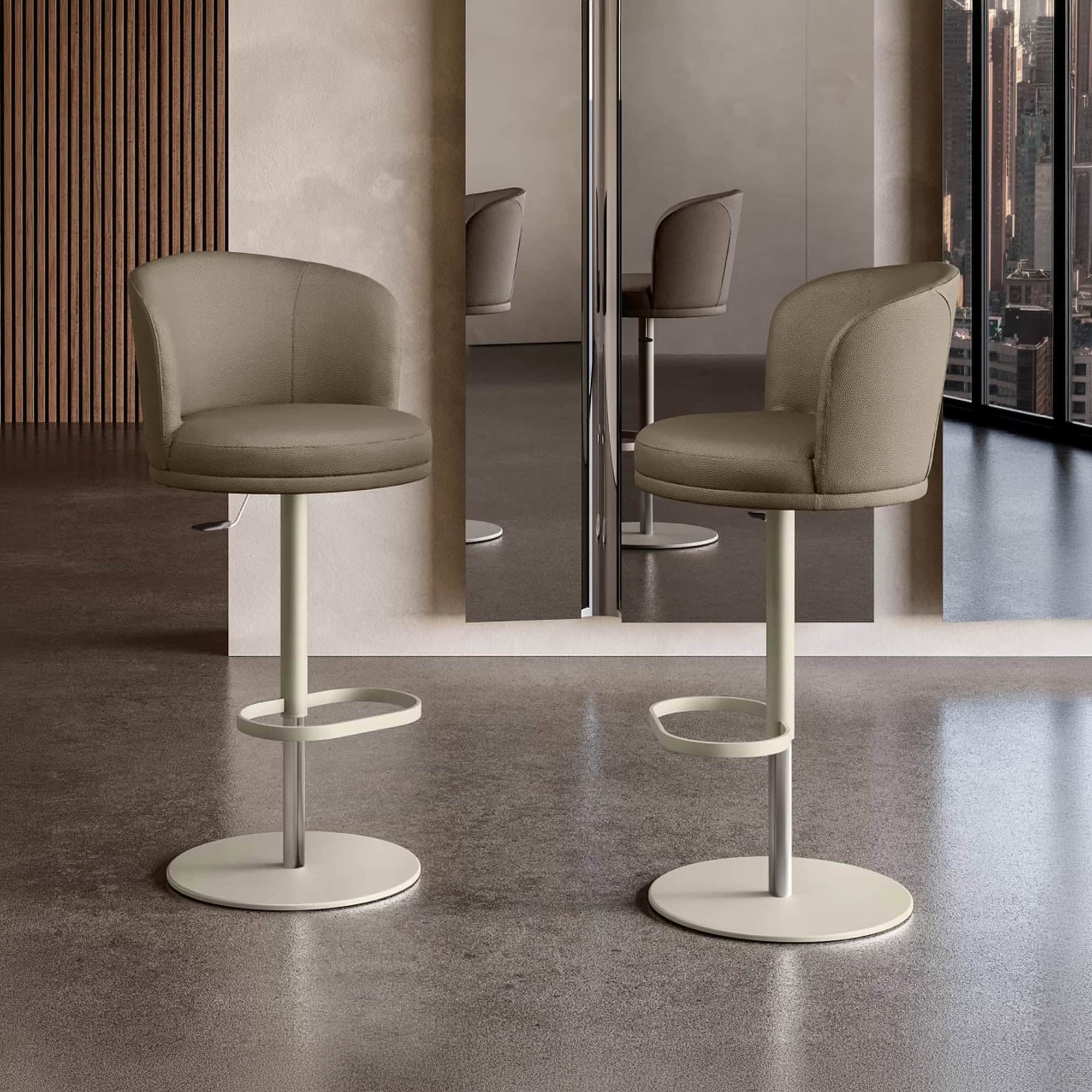Ginger upholstered bar stool with a modern design, beige fabric, and sturdy metal base. Perfect for.