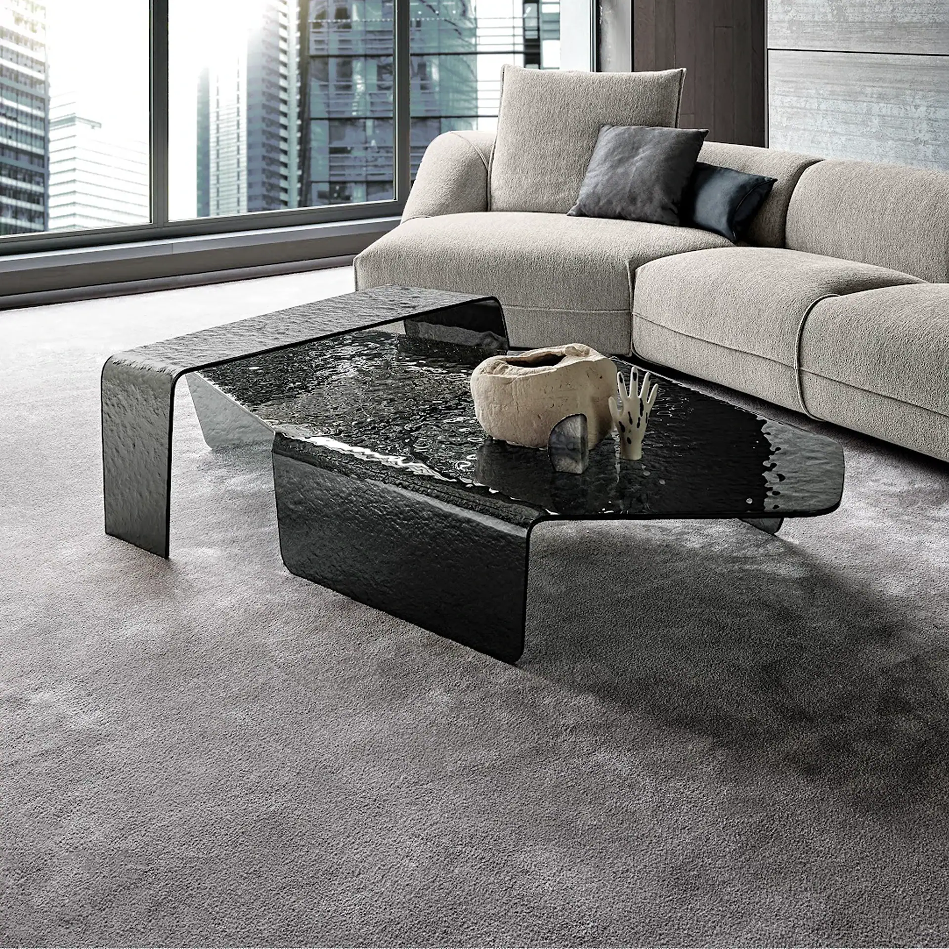 Sklar Furnishings Chimera Hammered Glass Coffee Table in modern living room.