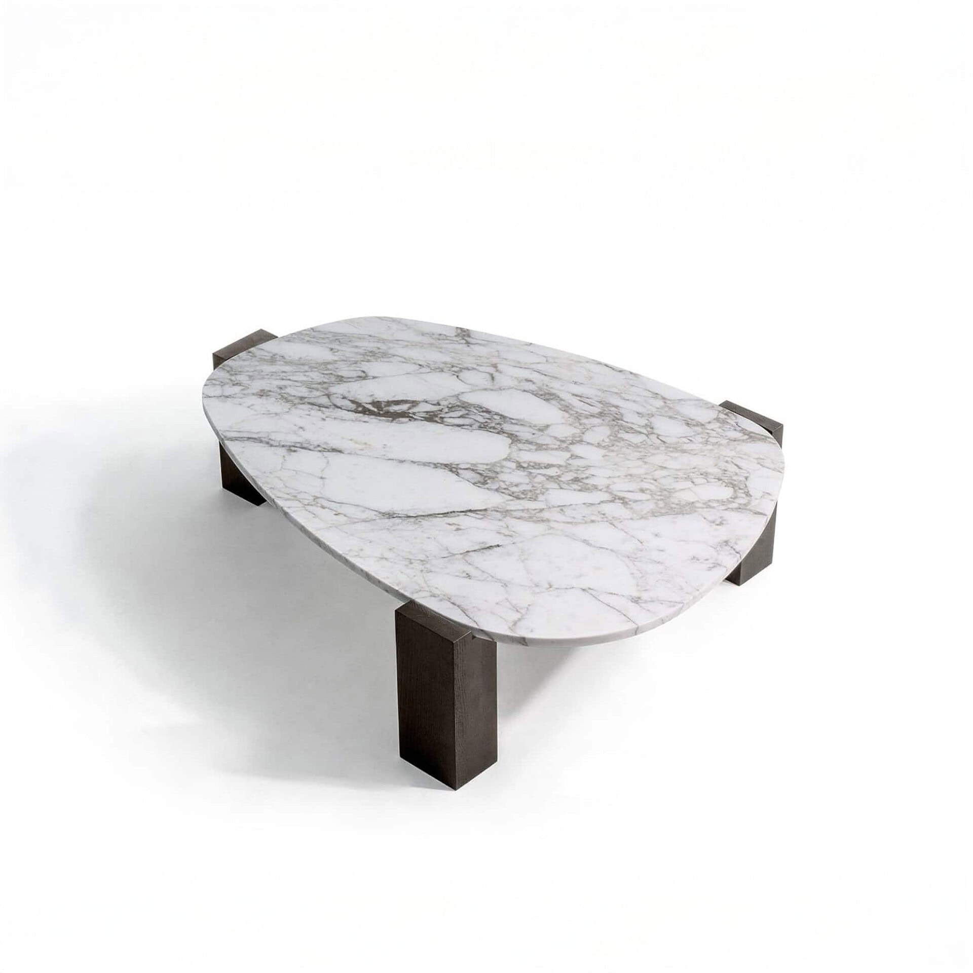 Studio product shot of the Gogan Sculptural Low Coffee Table with a polished marble top and sculptural wood base.