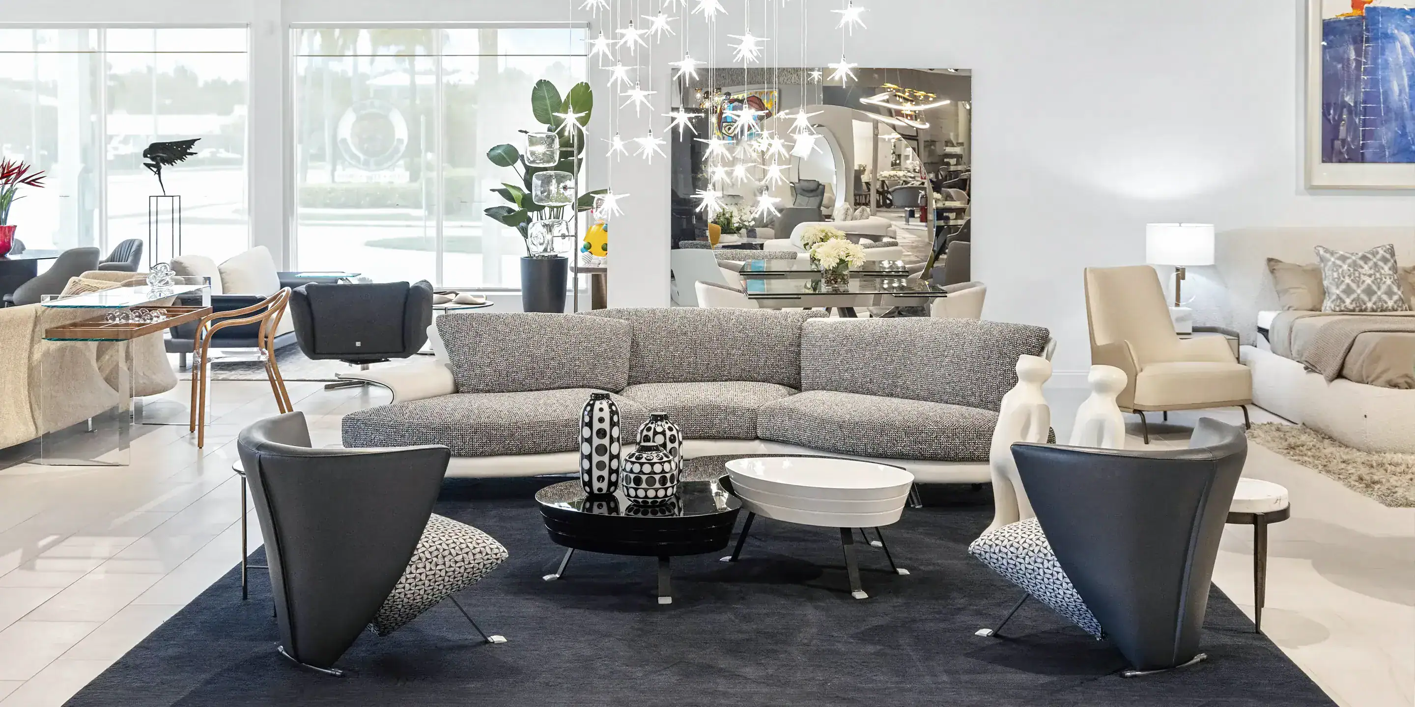 Modern furniture showroom with stylish sofas and chairs for living rooms.