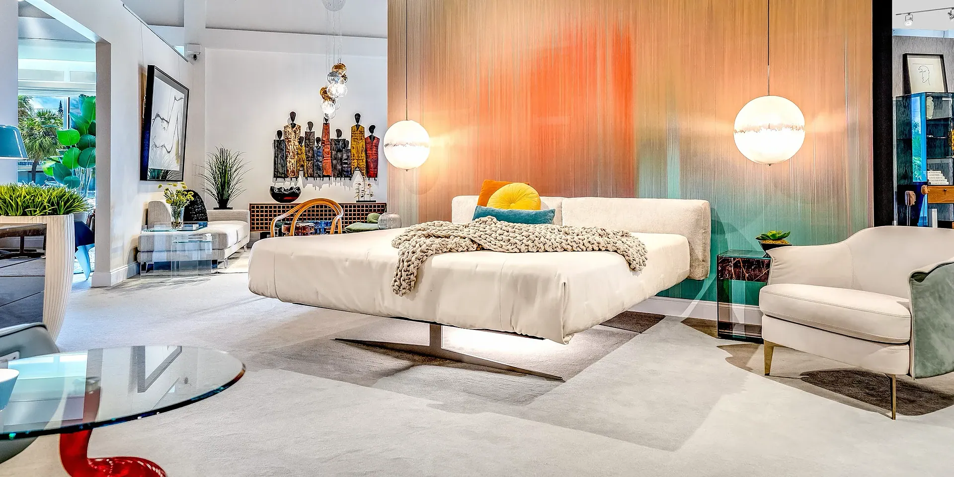 Luxurious modern bedroom with colorful decor and contemporary furnishings from Sklar Furnishings.