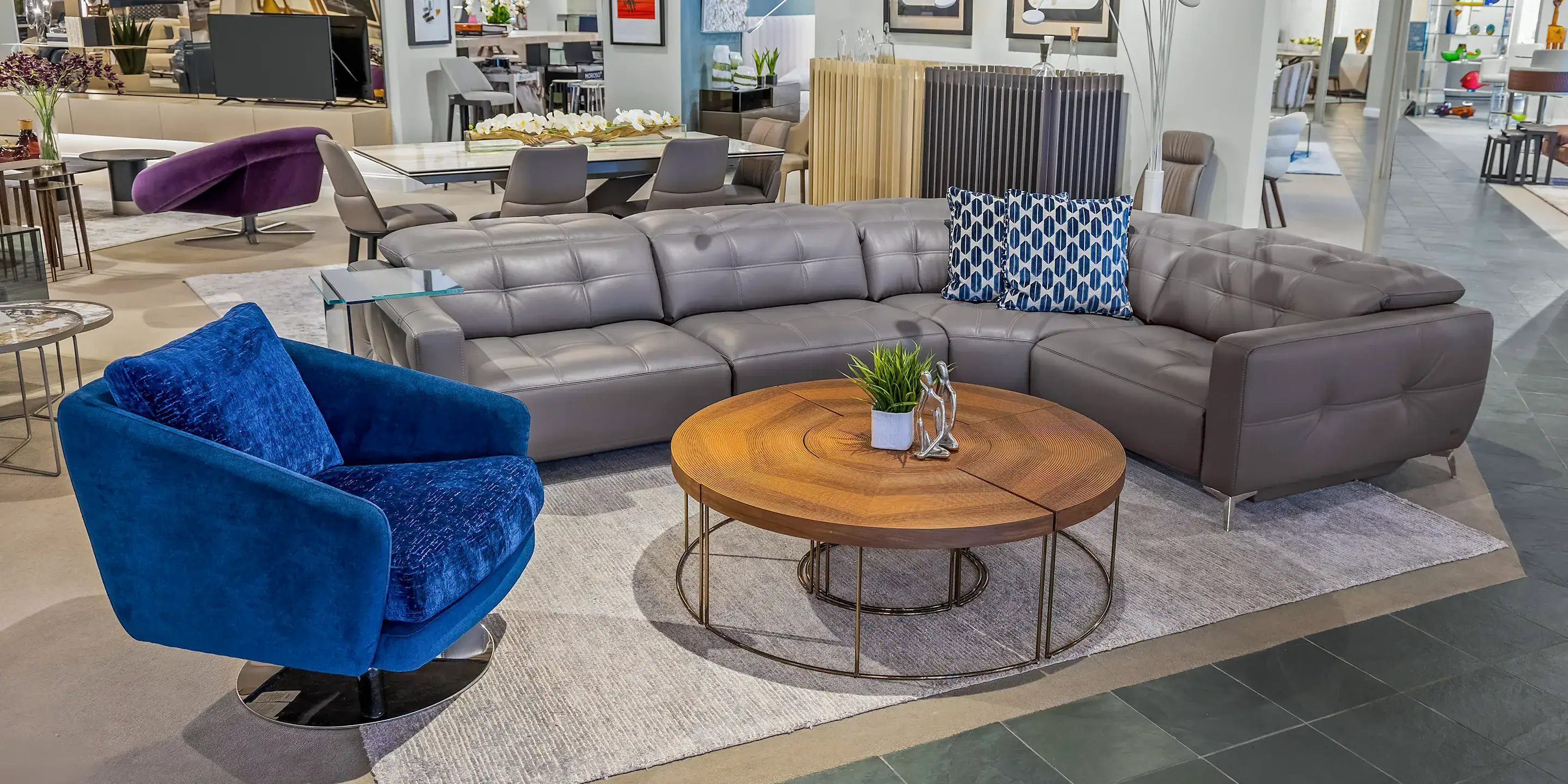 Comfortable sectional sofa with modern design in a stylish showroom setting.