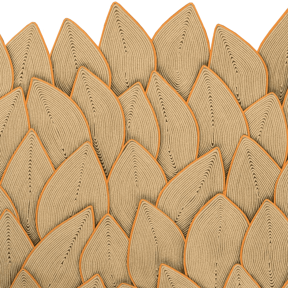 Decorative wood fireplace mantel with intricate carved leaf pattern, showcasing craftsmanship.