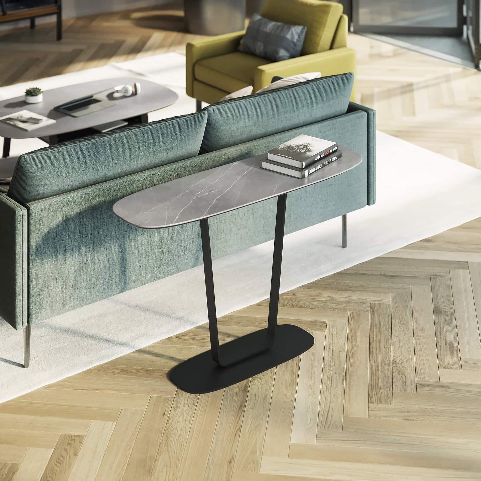 Cloud 9 Console Table in grey finish styled behind a sofa in a living room.