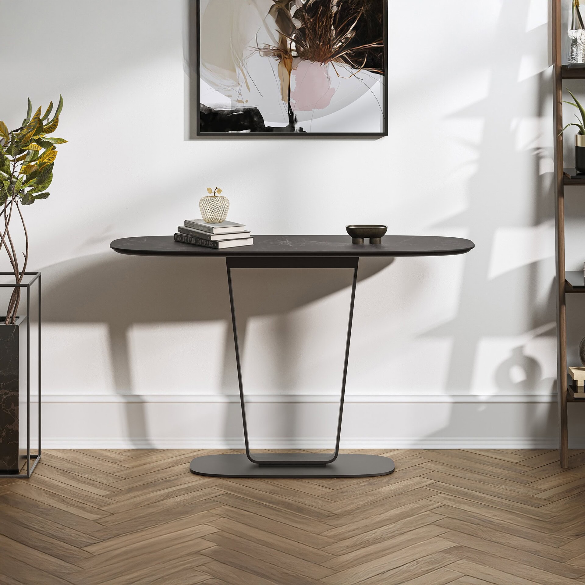 Cloud 9 Console Table in dark grey finish, styled in a modern entryway with books and décor.