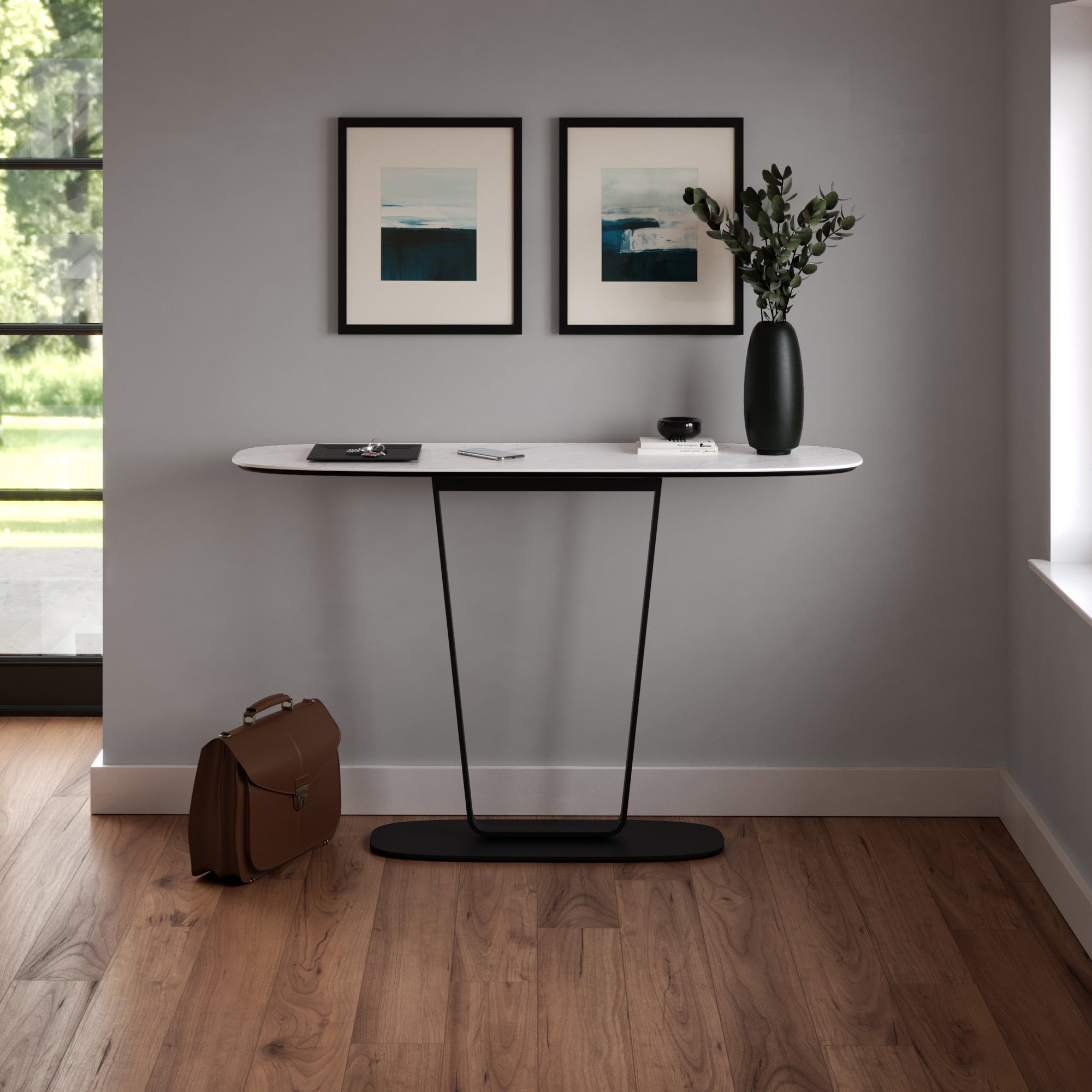 Cloud 9 Console Table in white finish styled against a grey wall with framed artwork and a plant.