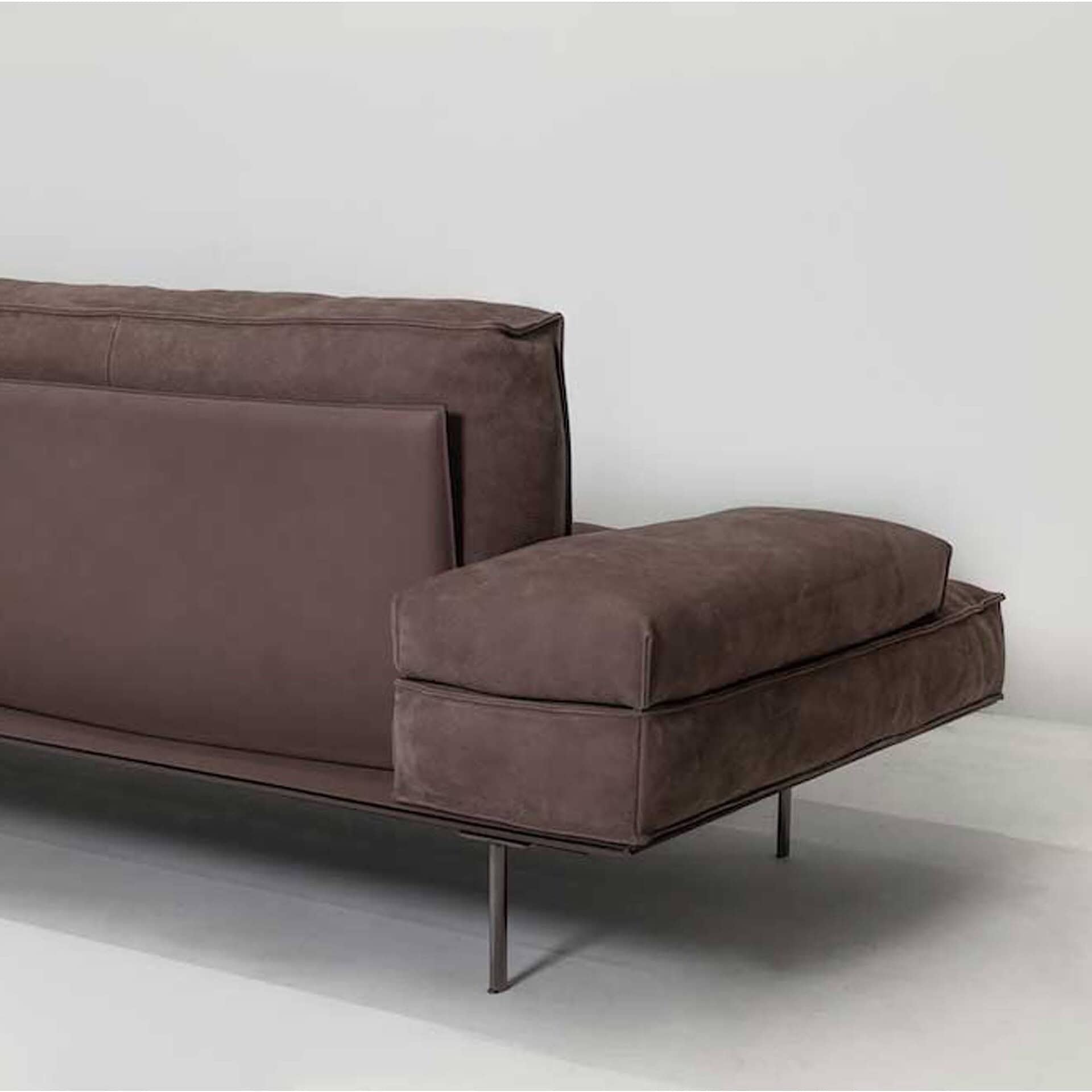 Luxurious brown sectional sofa with modern design, perfect for living rooms and stylish interiors.