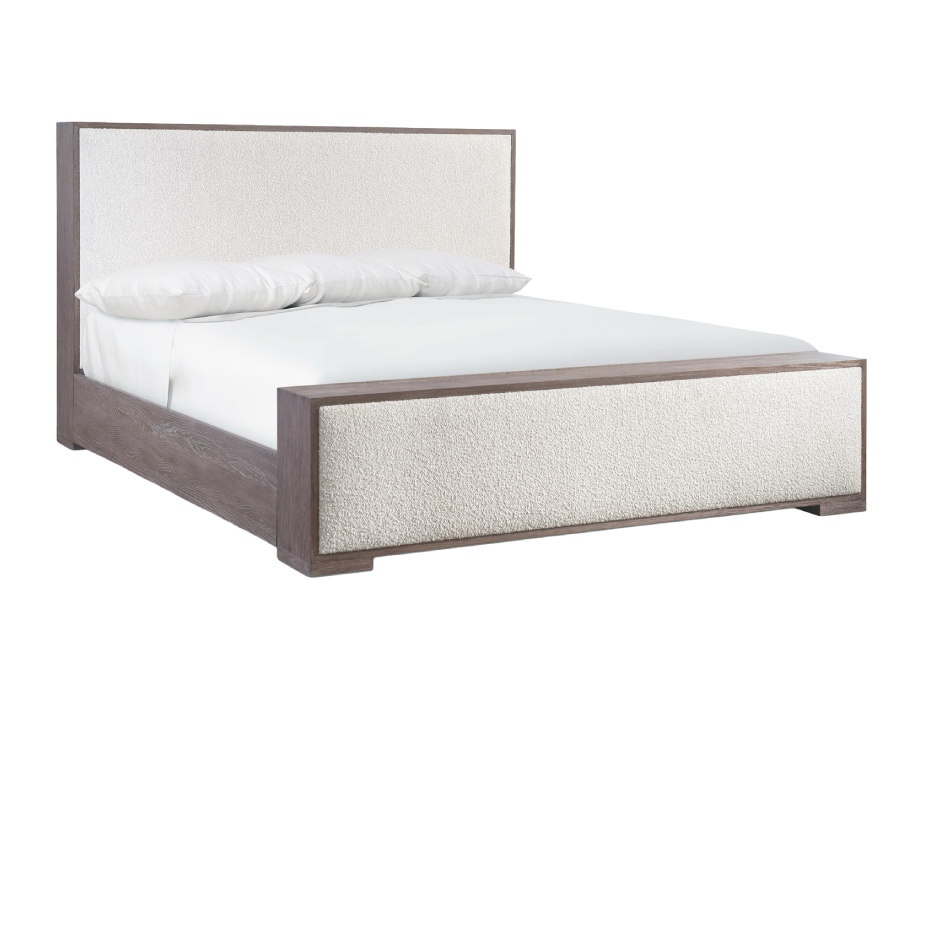 Modern bed with light gray wooden frame and cream upholstered headboard and footboard, made with white bedding, with the word 'SALE' in white text below.