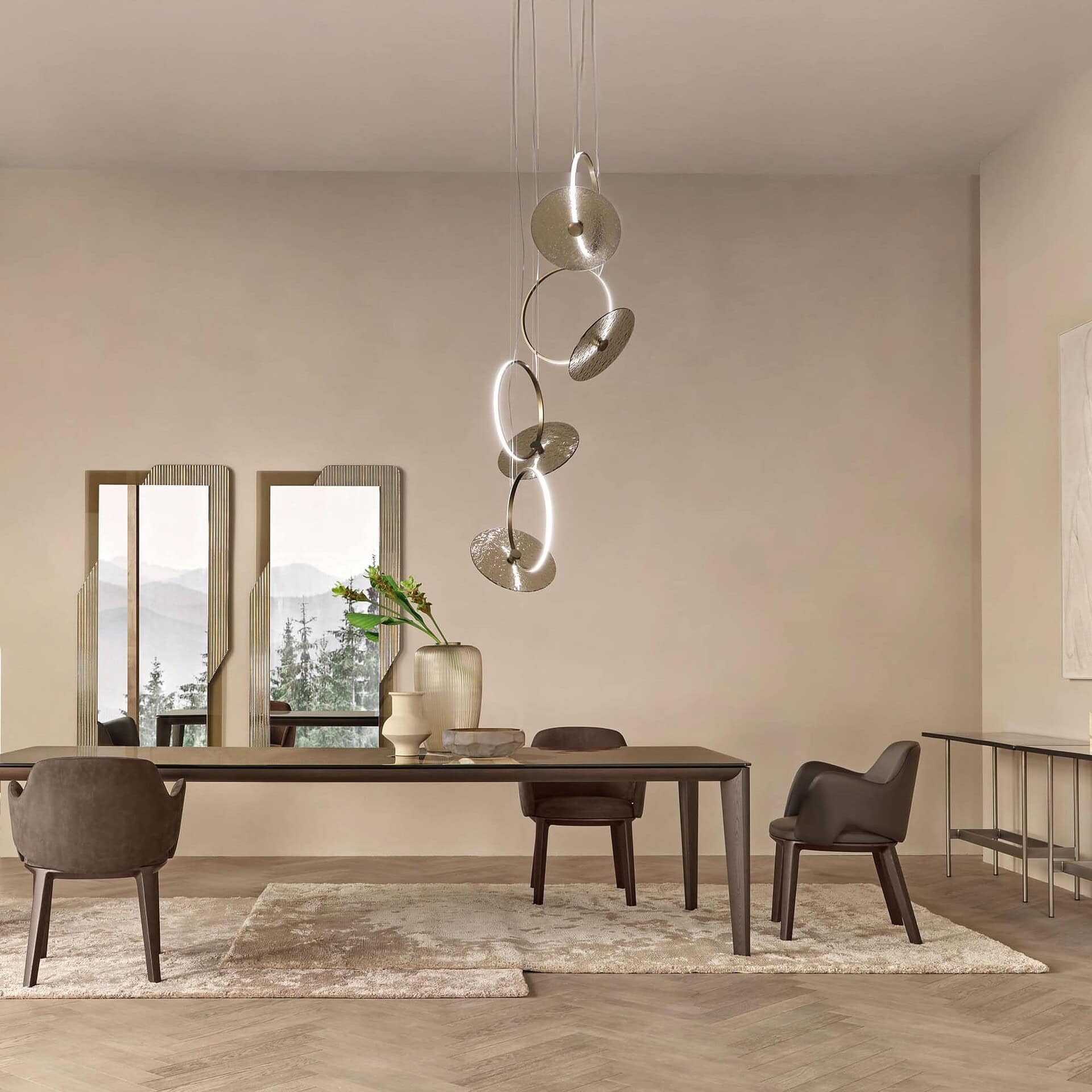 Marry Me Glass Pendant Light installation above a dining table in a contemporary interior.