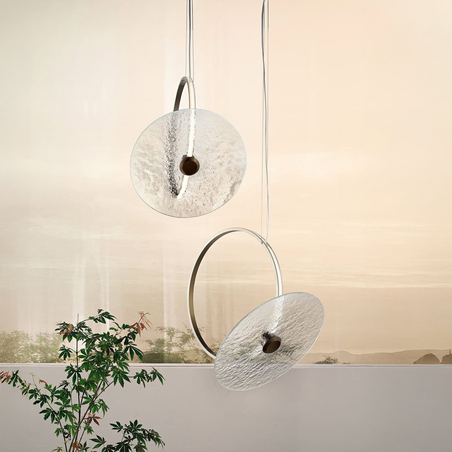 Marry Me Glass Pendant Light near a window, with natural daylight filtering through.