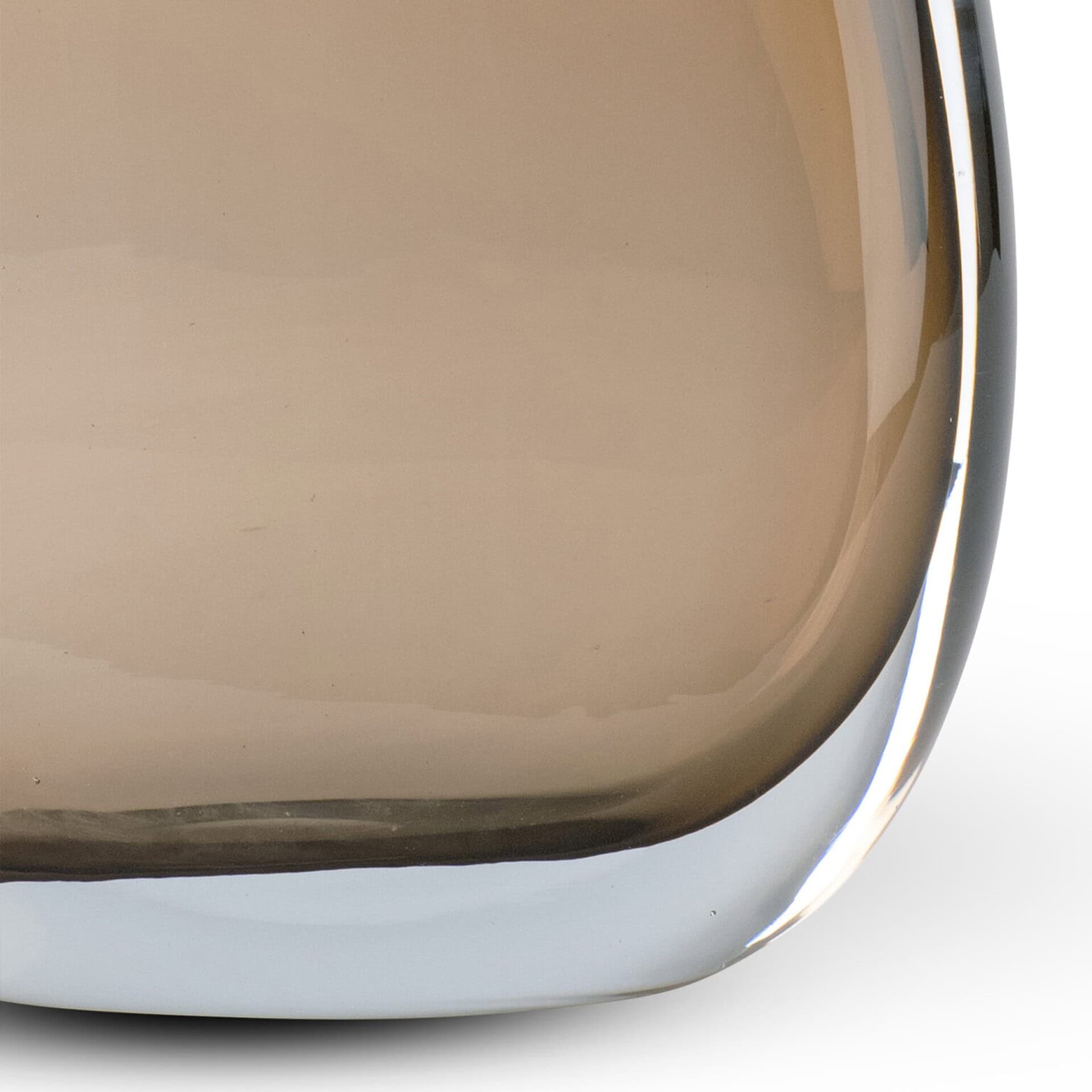 Close-up of Albion Table Lamp beige glass base with smooth curved finish.