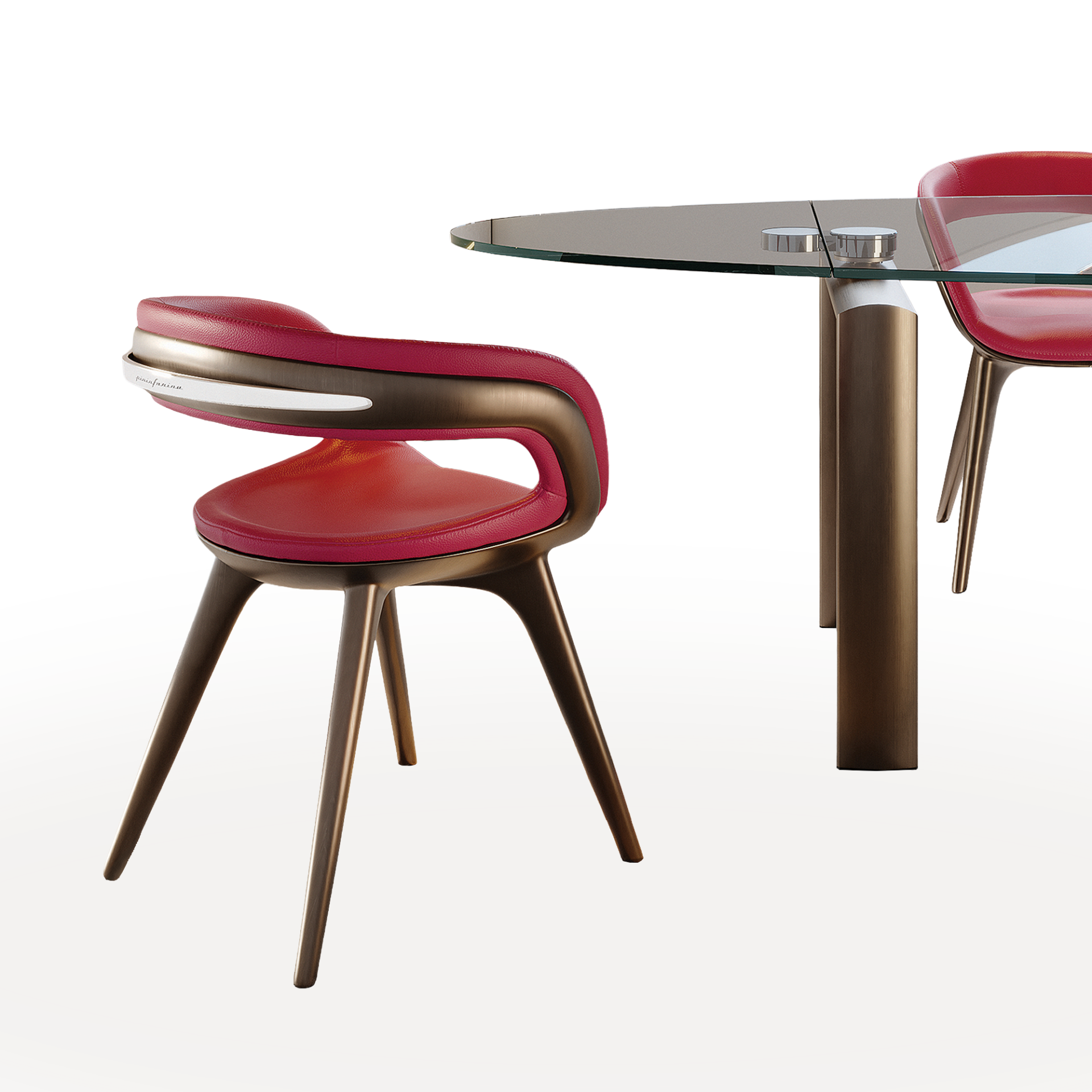 A modern dining set with a round glass table and two chairs. The chairs have red leather seats and bronze frames, with one chair showing a 'Pininfarina' logo.