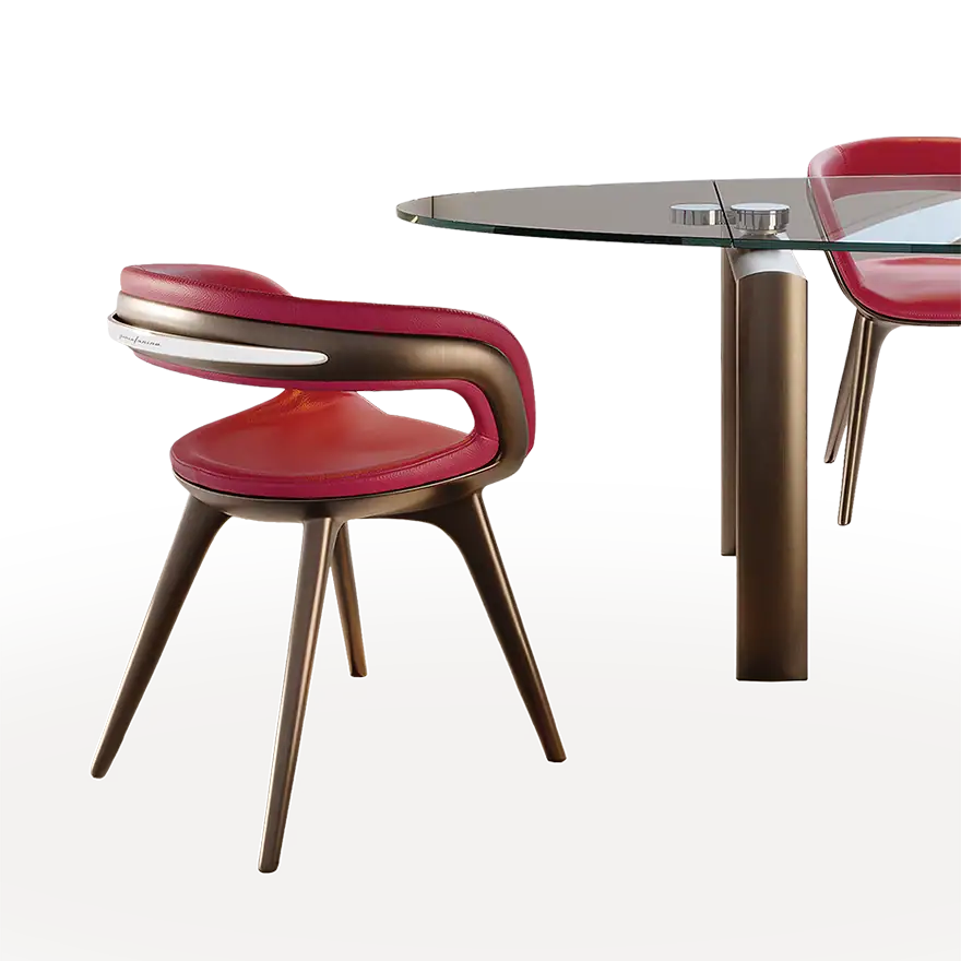 Red and beige upholstered dining chair with wooden legs, featured in Sklar Furnishings' 2025 collect.