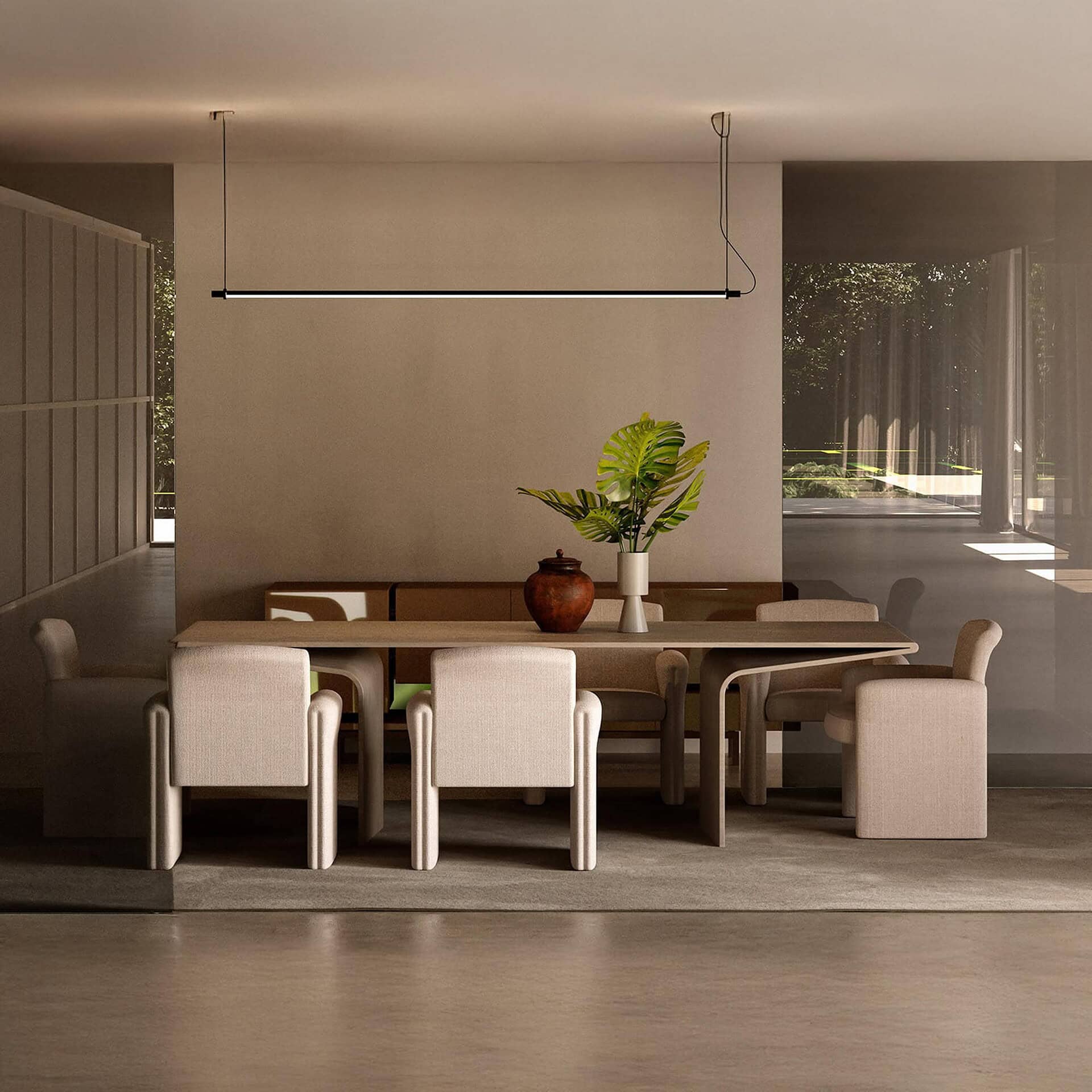 Quentin Upholstered Dining Chair set around a rectangular dining table in a contemporary interior.