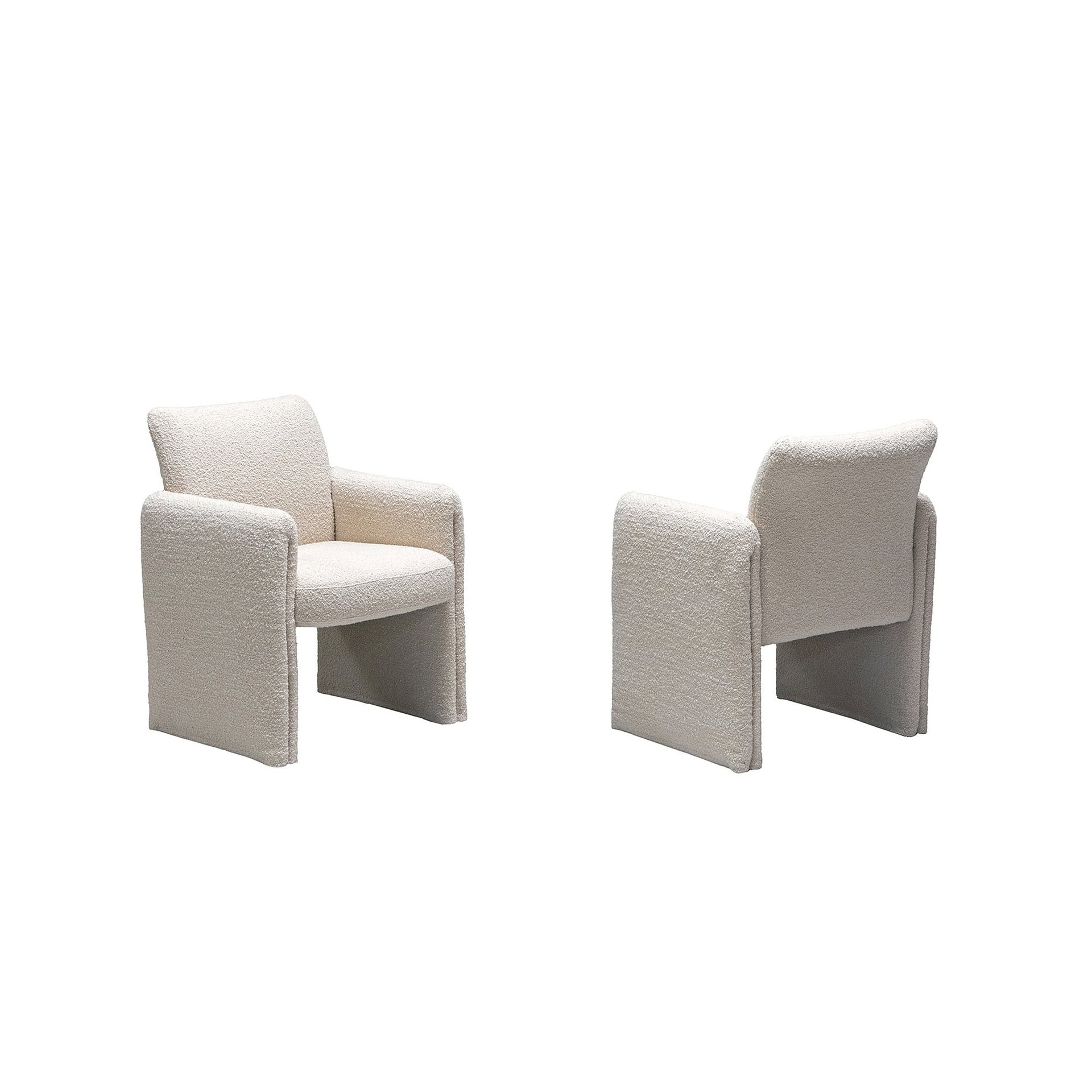 Pair of Quentin Upholstered Dining Chairs in light fabric upholstery, angled view.