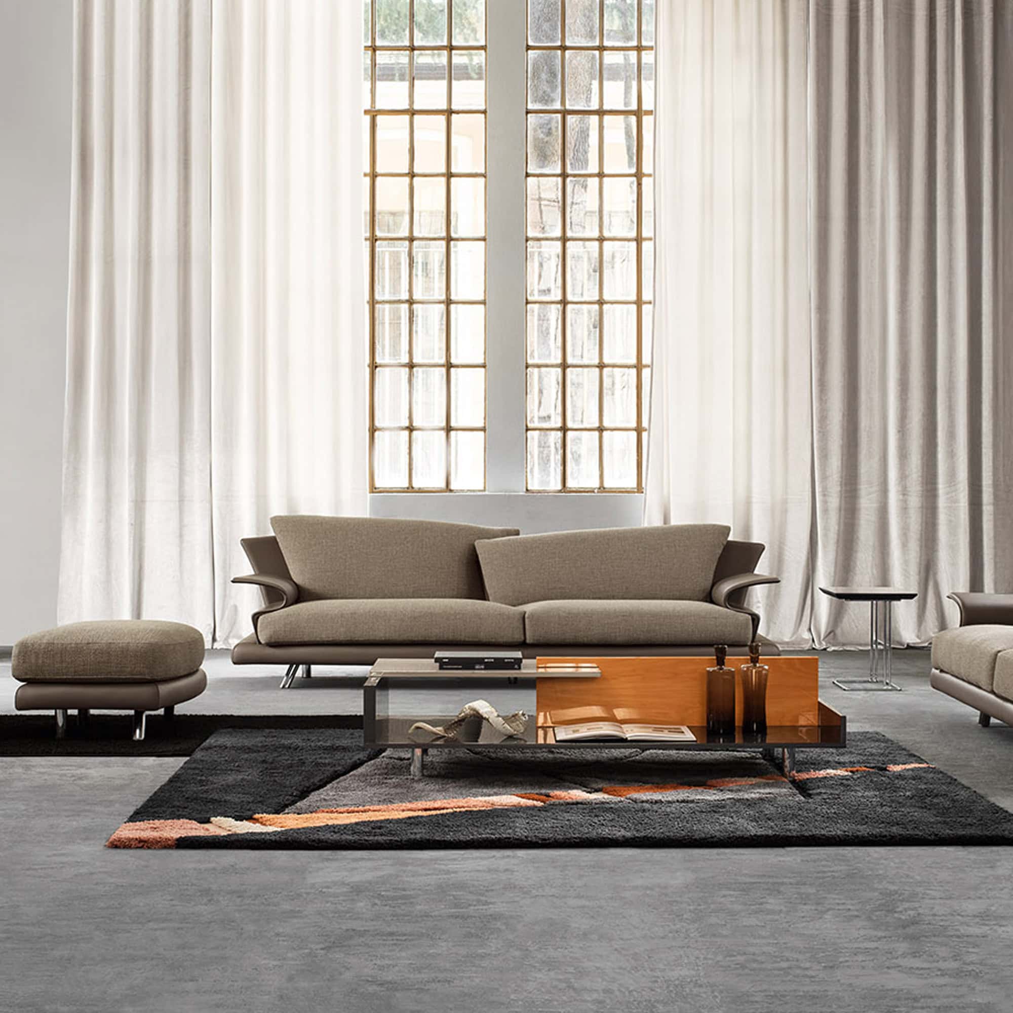 Modern neutral living room featuring Sklar Furnishings sofas, coffee table, and stylish decor for sophisticated interiors.