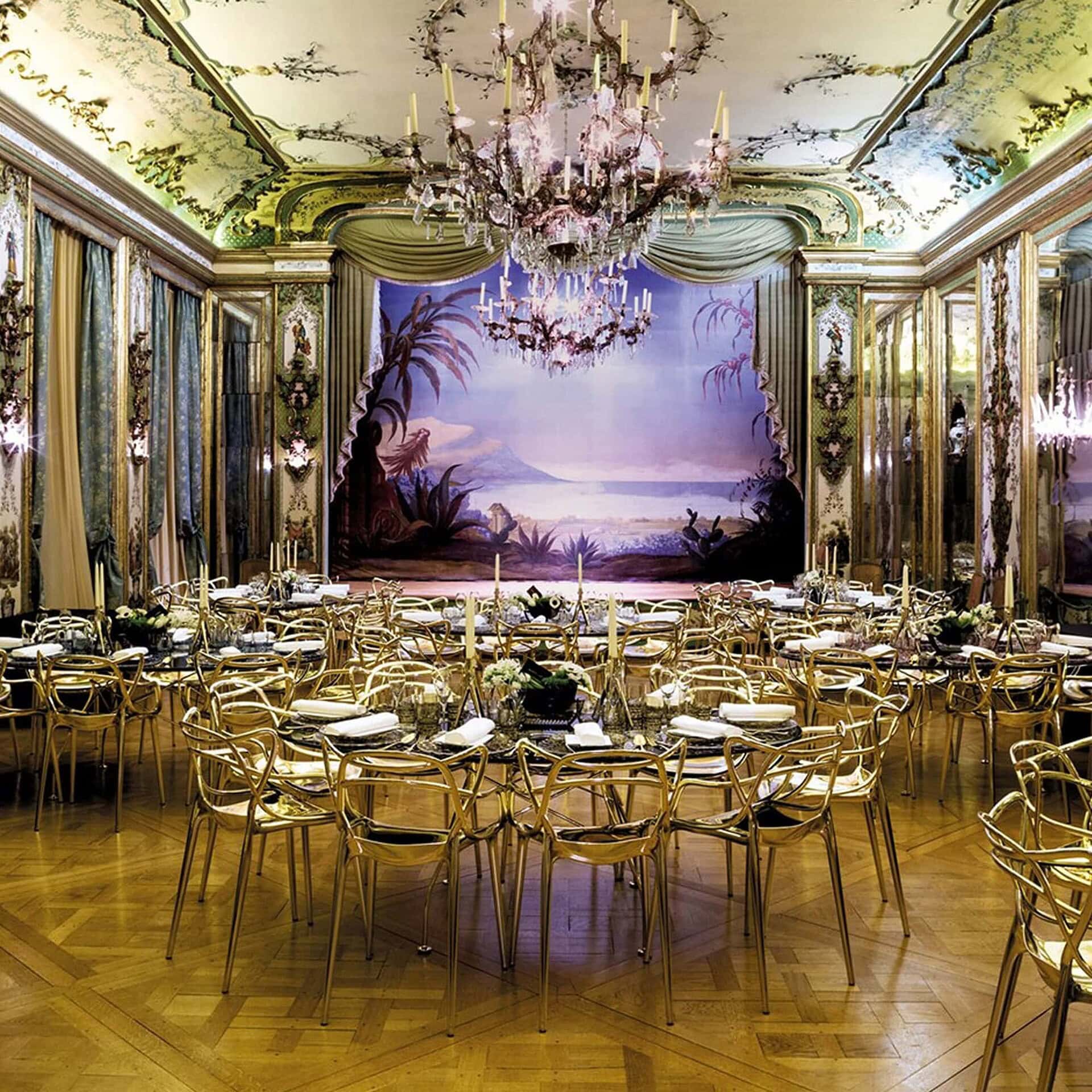 Large banquet hall with rows of Masters Metal Dining Chairs arranged around round tables.