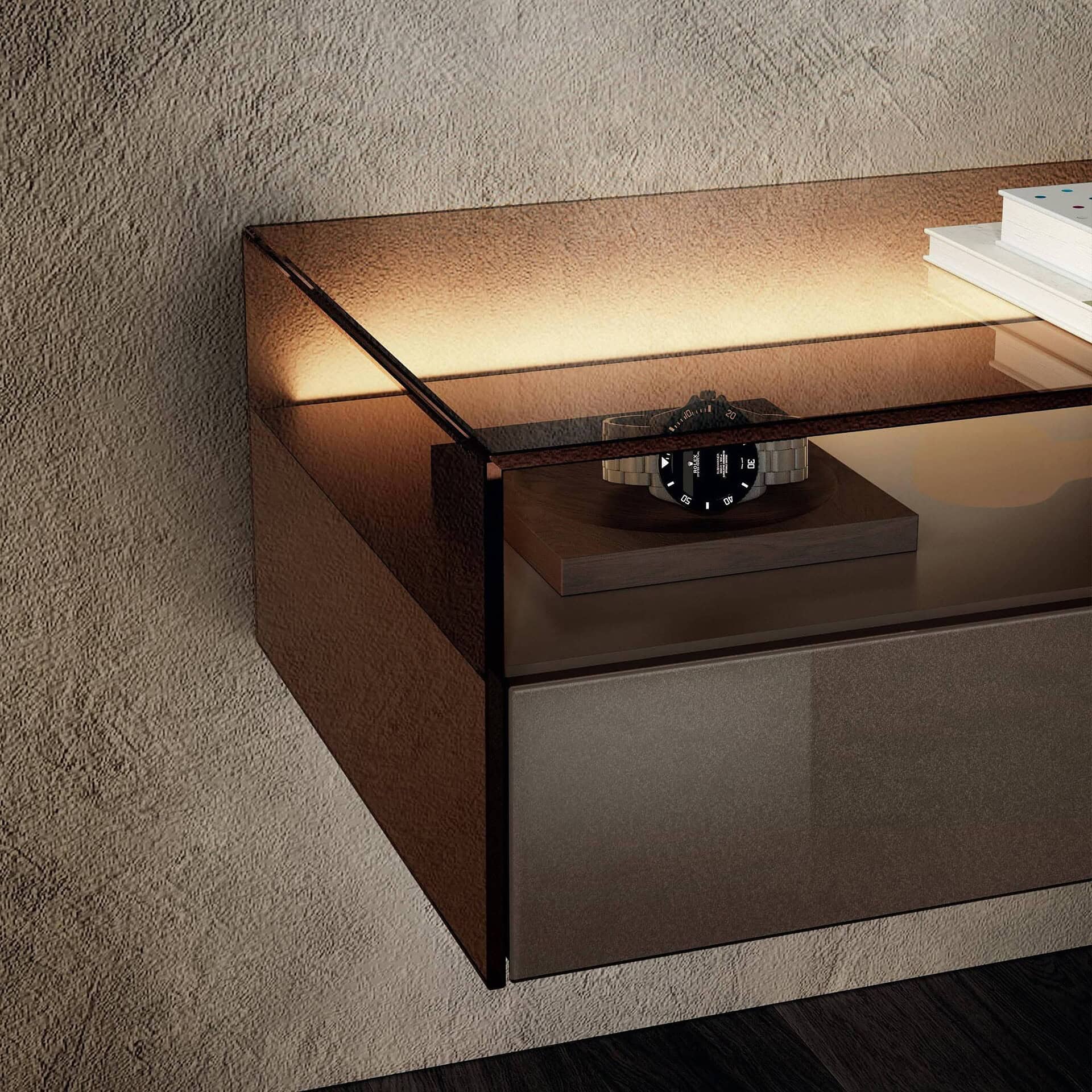 Angled detail view of the Hom Bedside Table highlighting smoked glass and drawer design.